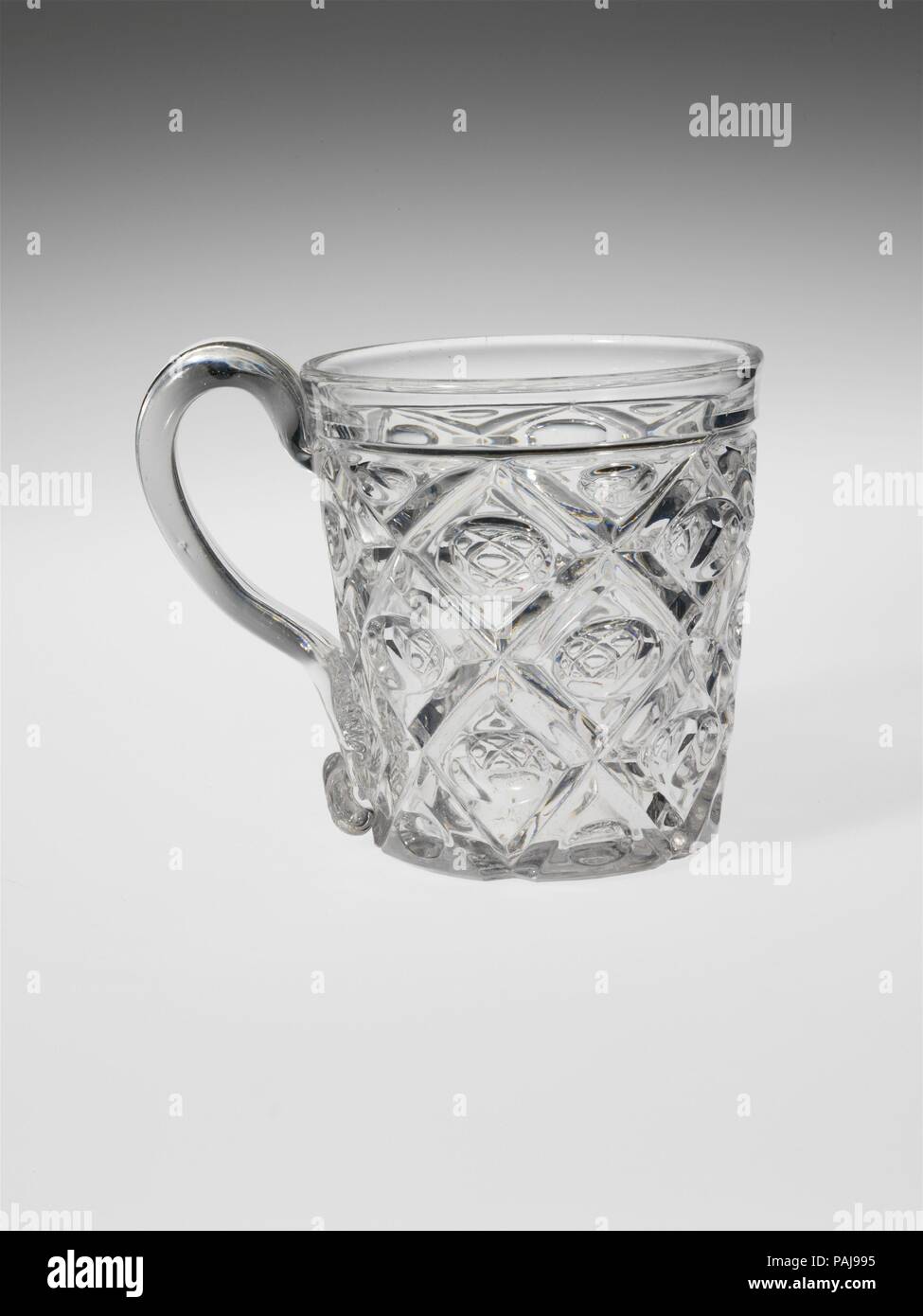 Mug. Culture: American. Dimensions: H. 3 1/4 in. (8.3 cm). Date: 1850-70.  With the development of new formulas and techniques, glass-pressing  technology had improved markedly by the late 1840s. By this time,