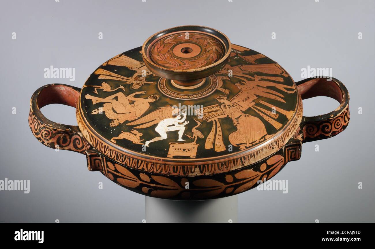 Terracotta lekanis (covered dish). Culture: Greek, Attic. Dimensions: Overall: 7 9/16in. (19.2cm)  Other (total height): 7 9/16 x 11 3/4in. (19.2 x 29.9cm). Date: ca. 400 B.C..  On the lid, woman, youths, and Erotes  Many covered dishes of this type were decorated with scenes of women. Apparently, they were often brought to brides to fill with food and other gifts. Museum: Metropolitan Museum of Art, New York, USA. Stock Photo
