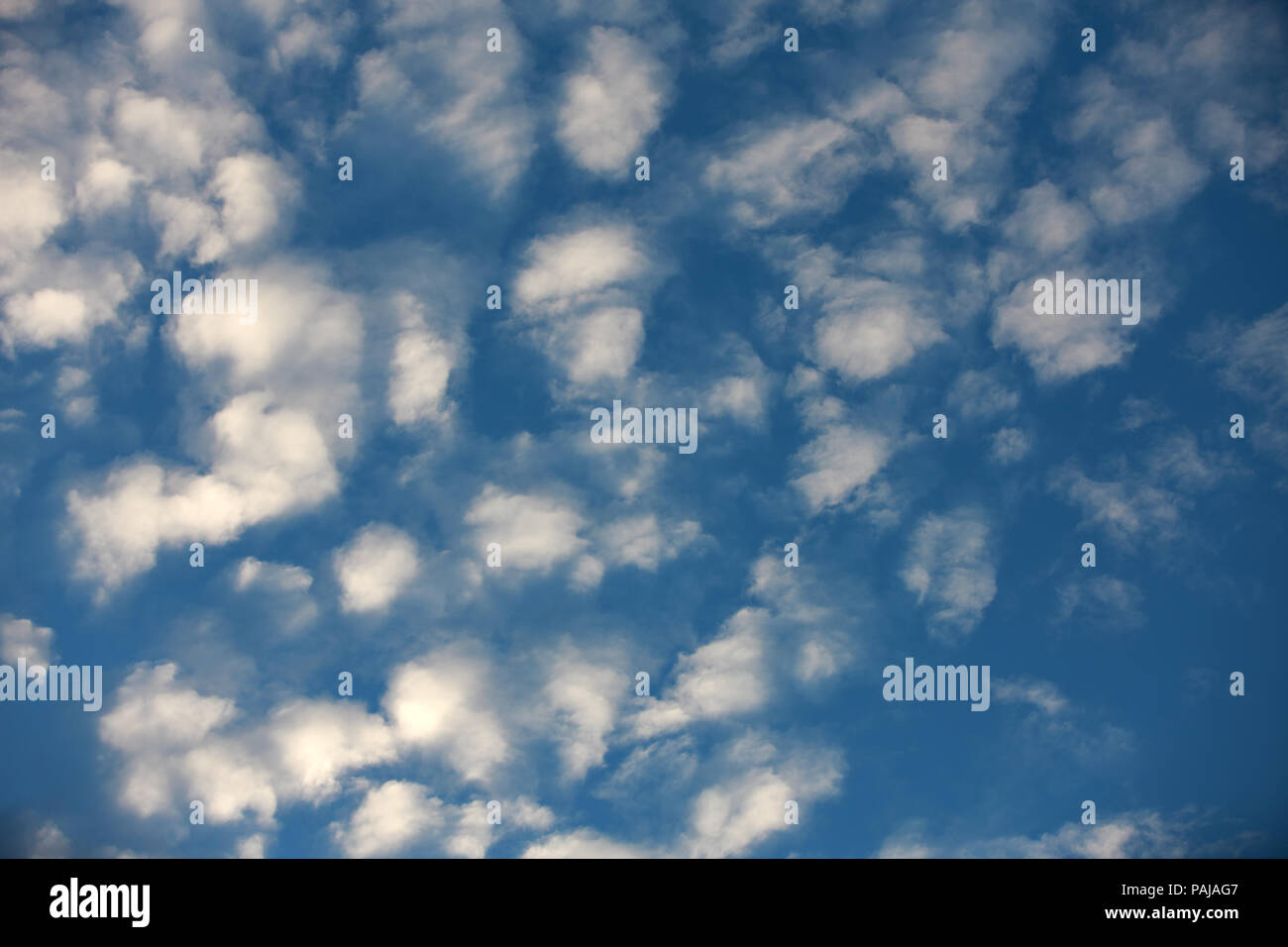 White Fair-weather clouds on a blue sky Stock Photo
