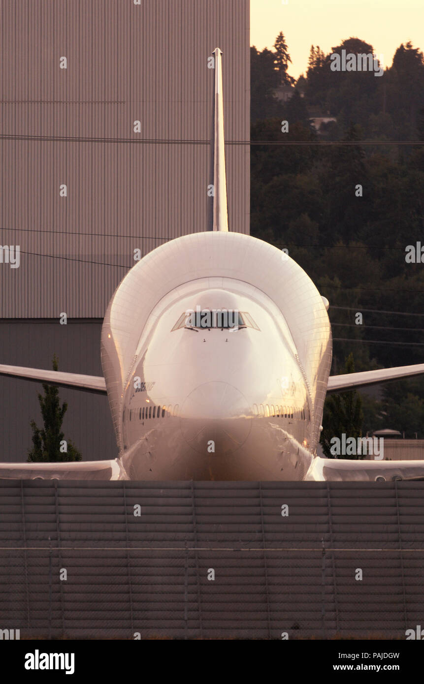 nose of a Boeing 747 LCA Dreamliner parked at dusk. Part of the special Boeing 7-series airliner customer party airshow celebrations on the eve of the Stock Photo