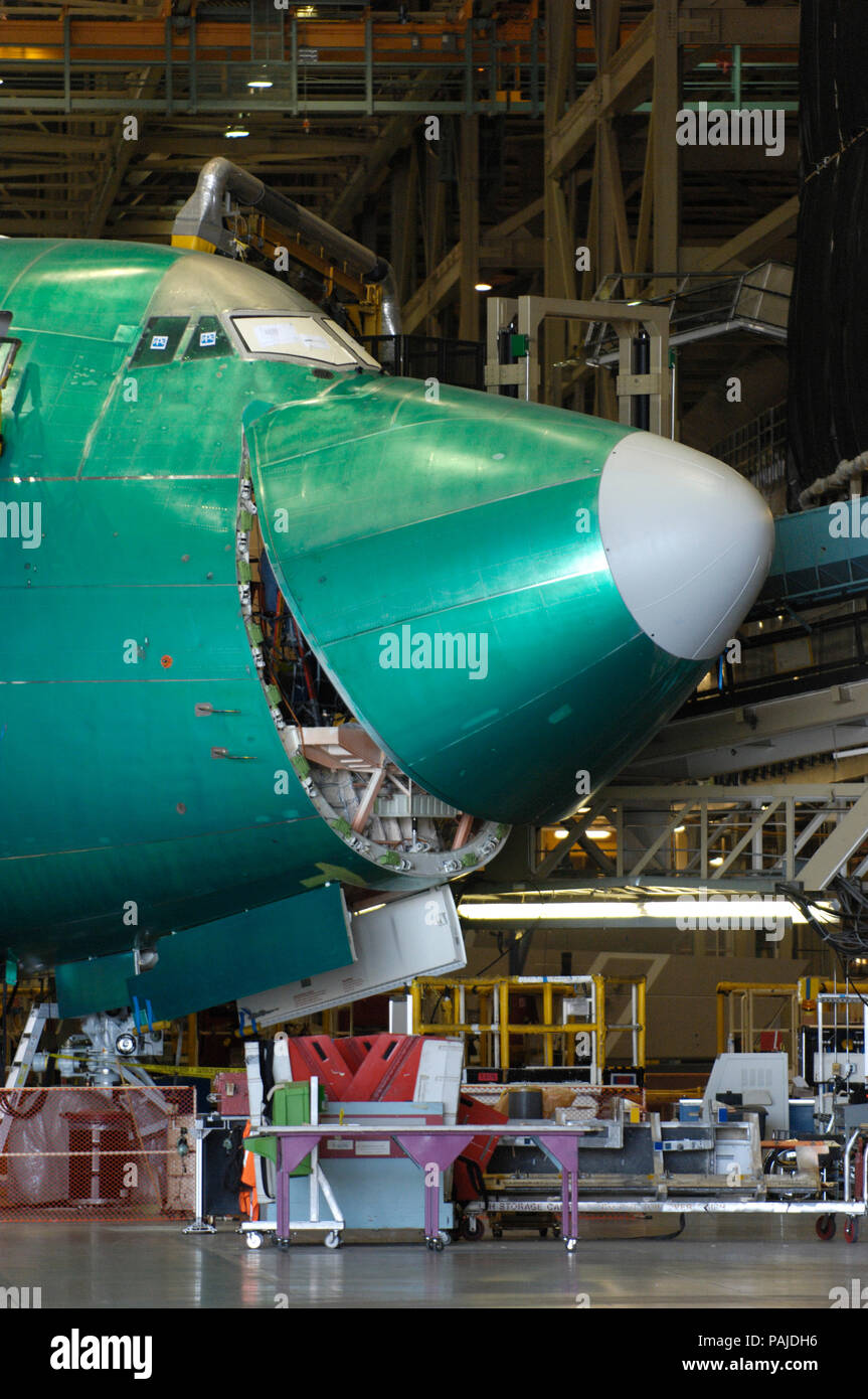 a Jade Cargo International Boeing 747-400F (LN1391) on the production-line with the nose cargo door closing Stock Photo