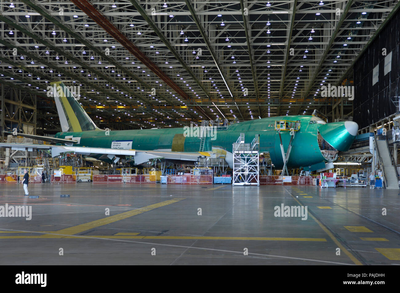 a Jade Cargo International Boeing 747-400F (LN1391) on the production-line with the nose cargo door closing Stock Photo