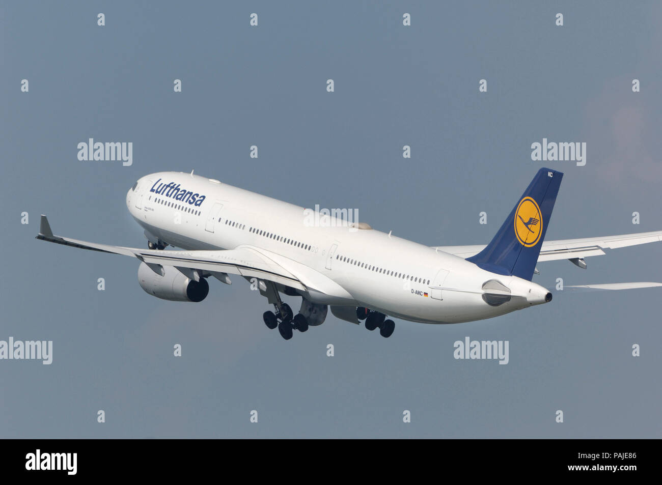 Lufthansa Airbus A330-300 climbiong out after take-off with undercarriage retracting Stock Photo