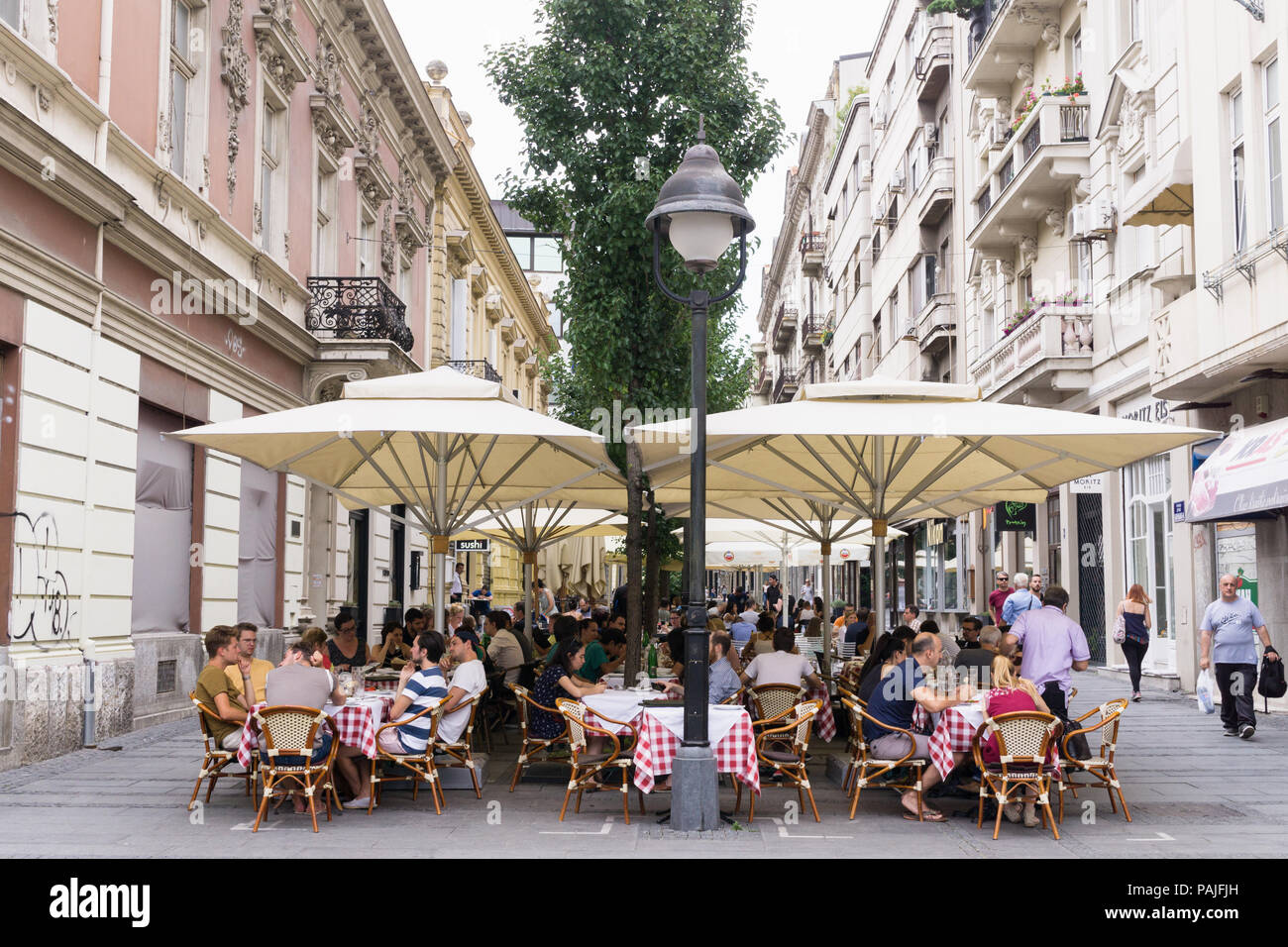 Patrons having lunch at the Prolece (Spring) restaurant in Belgrade, Serbia. Stock Photo