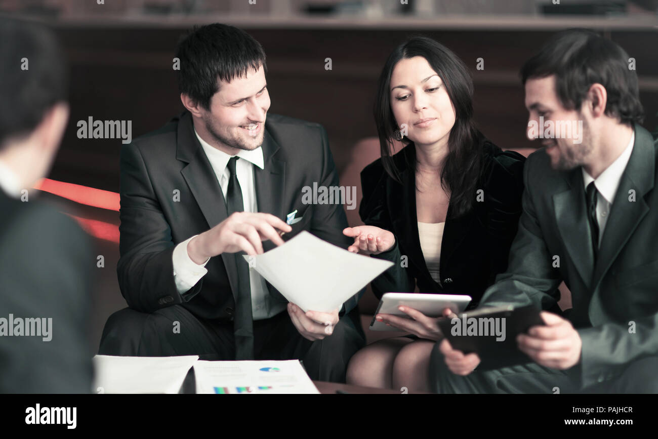 group of successful businessmen. Discussing an important aspect with partners Stock Photo