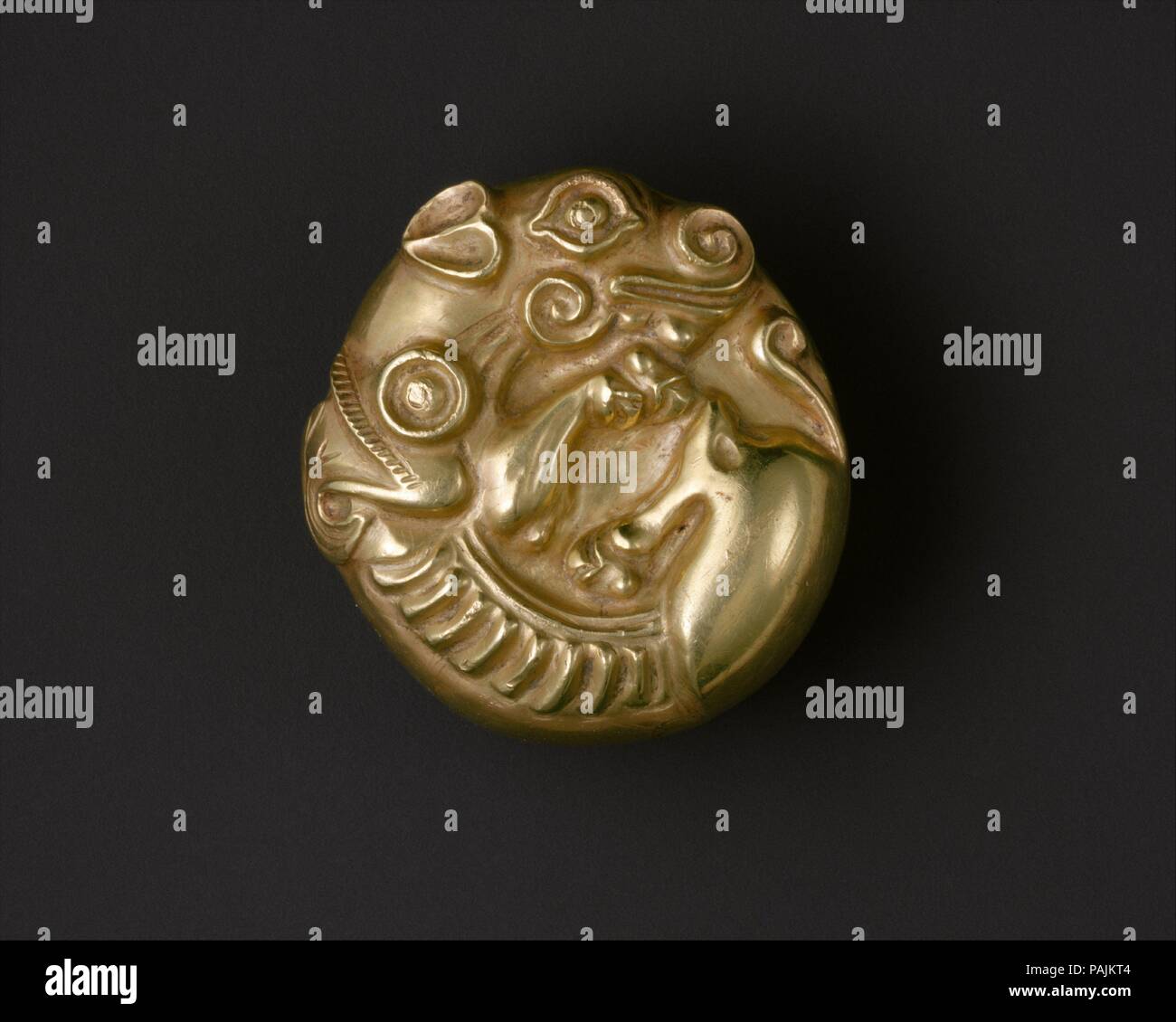 Pommel in the shape of coiled animals. Culture: Scythian. Dimensions: 0.91 x 1.57 in. (2.31 x 3.99 cm). Date: ca. 6th century B.C.. Museum: Metropolitan Museum of Art, New York, USA. Stock Photo