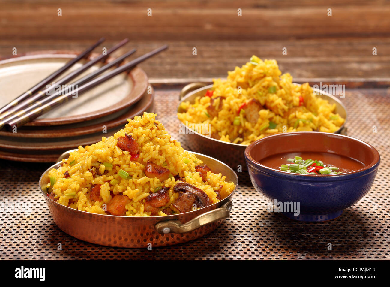 Chicken with basmati rice fried in stainless pan Stock Photo Alamy