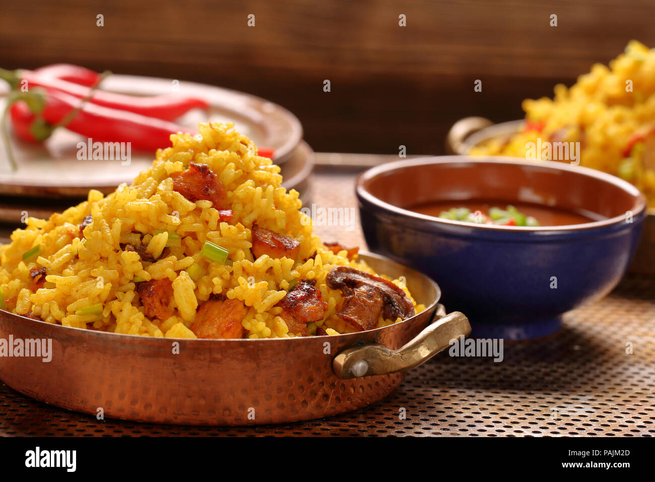Chicken with basmati rice fried in stainless pan Stock Photo Alamy