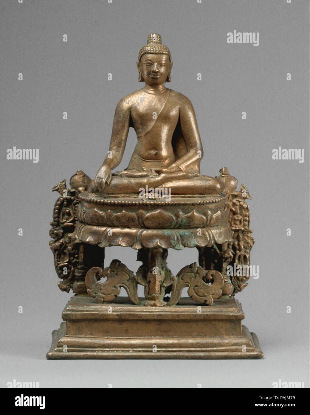 Lotus-Enthroned Buddha Akshobhya, the Transcendent Buddha. Culture: Bangladesh (probably Comilla District). Dimensions: H. 7 15/16 in. (20.2 cm); W. 5 1/4 in. (13.4 cm). Date: 8th-early 9th century.  Akshobhya is one of the five Transcendent Buddhas of Esoteric Buddhism. Elephants are his traditional mount. Museum: Metropolitan Museum of Art, New York, USA. Stock Photo