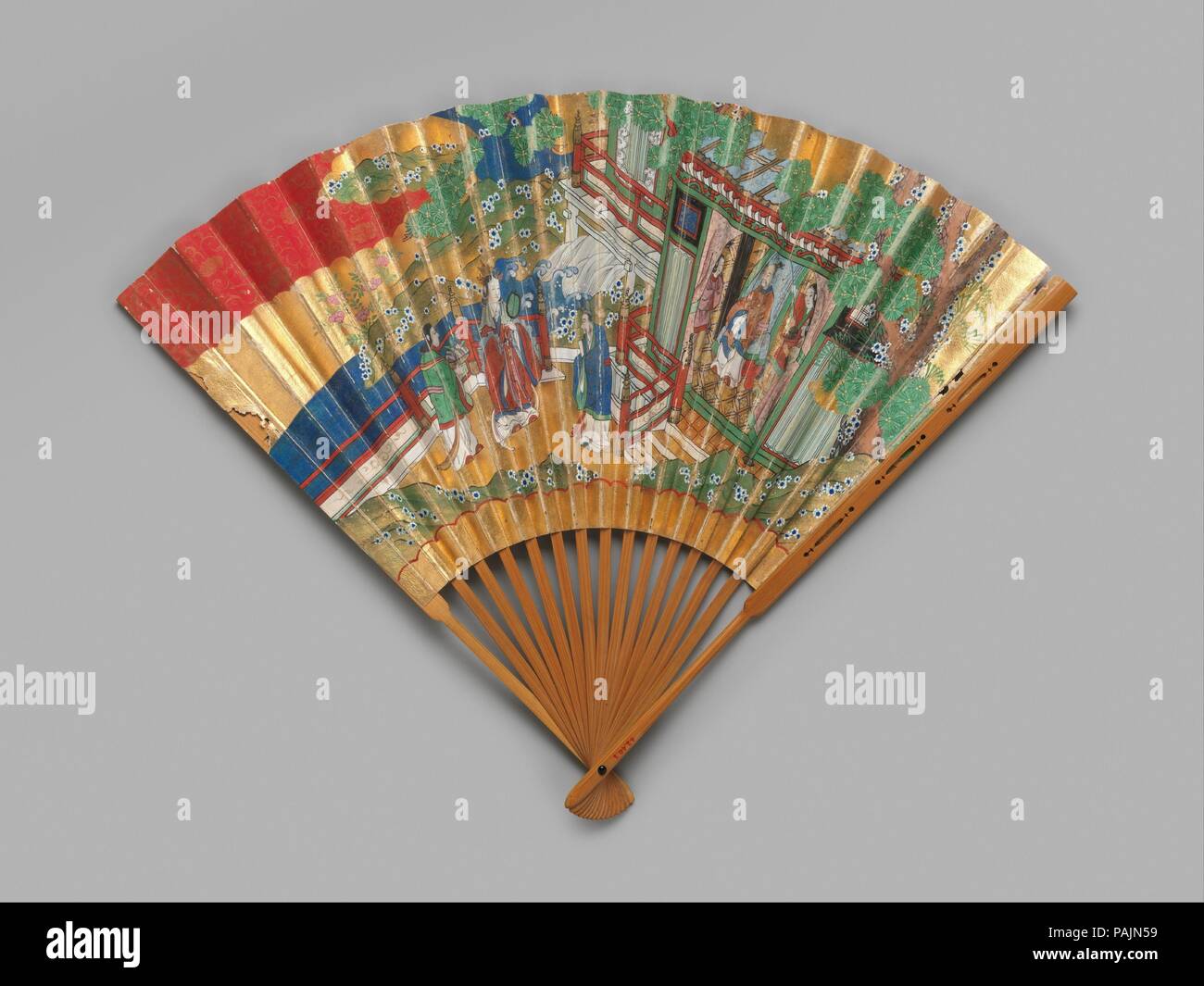 Chukei Fan. Culture: Japan. Dimensions: 13 1/4 × 19 in. (33.7 × 48.3 cm). Date: 19th century.  In the refined and simplified performances of the Noh theater, the fan plays an important role in delineating character. The design, colors of the ground and color of the lacquer on the bamboo frame vary, depending on the role being performed. Cherry blossoms and pine are depicted on one side of this fan, and the Queen of the West and the King of the East of Chinese legend appear on the reverse. The chukei fan which spreads out toward the top when closed, is appropriate for a female actor. Museum: Me Stock Photo