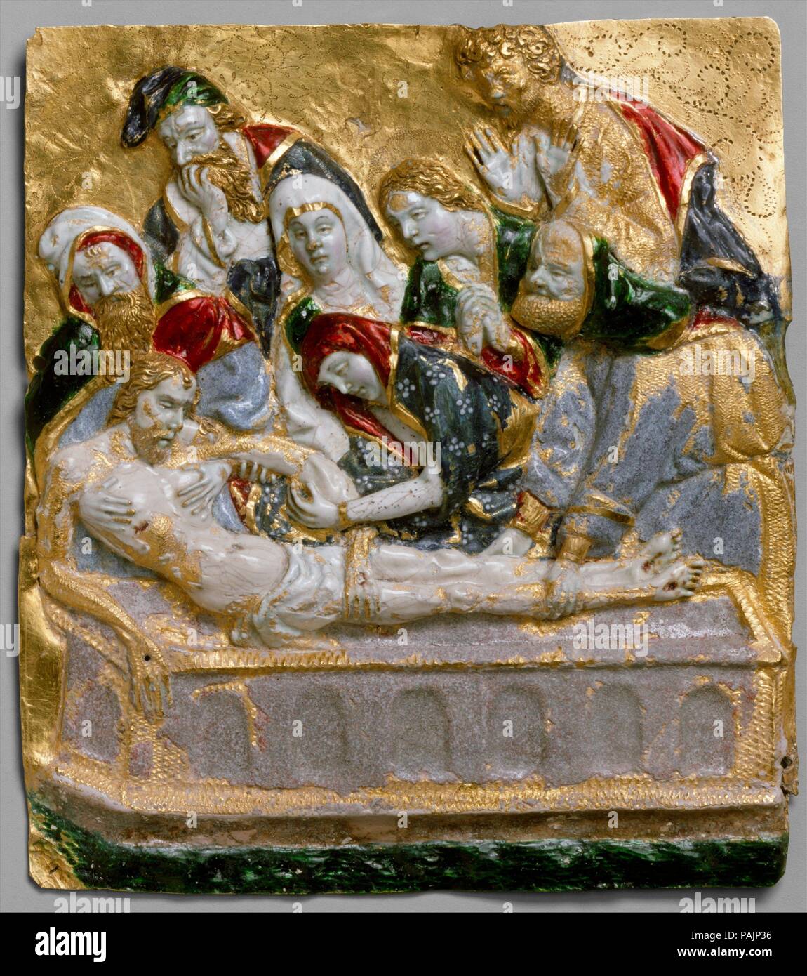 The Entombment of Christ. Culture: French. Dimensions: Overall: 3 7/16 x 3 1/16 x 3/16 in. (8.7 x 7.7 x 0.5 cm). Date: ca. 1390-1405.  The entombment of Christ after the Crucifixion is variously described in the Four Gospels. Each of the accounts notes the presence of a wealthy man at the scene, Joseph of Arimathea; with him, according to Matthew and Mark, were Mary Magdalene and Mary, the mother of James. However, only the Gospel of Saint John refers to Nicodemus, a Pharisee, as being in attendance. None of the Gospels describes the crowd of mourners gathered at the bier, as seen here, but th Stock Photo