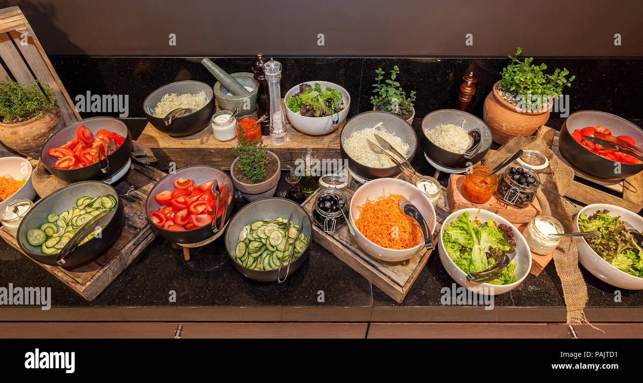 Fresh Vegetables Salads Food Bar with assortment of ingredients Stock