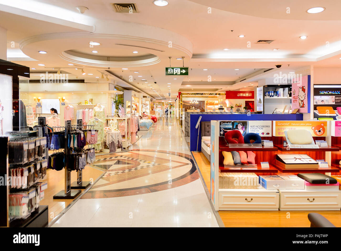 SHANGHAI, CHINA - APR 3, 2016: Interior of the New World Emporium shopping center in Shanghai, China,  located at the Nanjing Road. Stock Photo