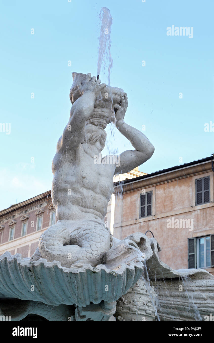 Baroque Triton Fountain (Fontana del Tritone) in Rome Italy Stock Photo