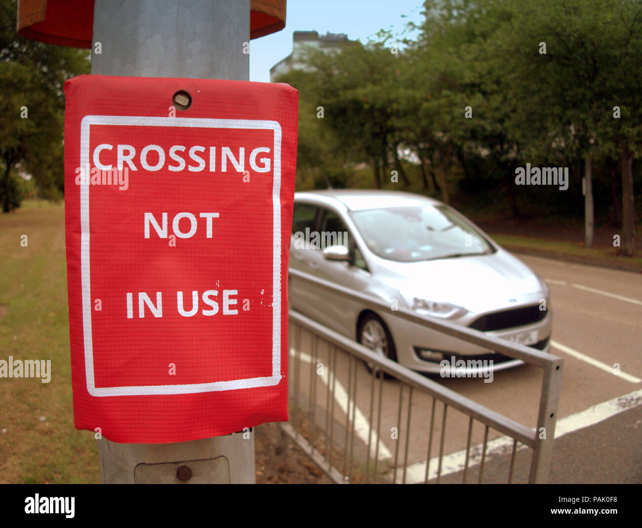 crossing not in use covers pedestrian crossing no lights Stock Photo