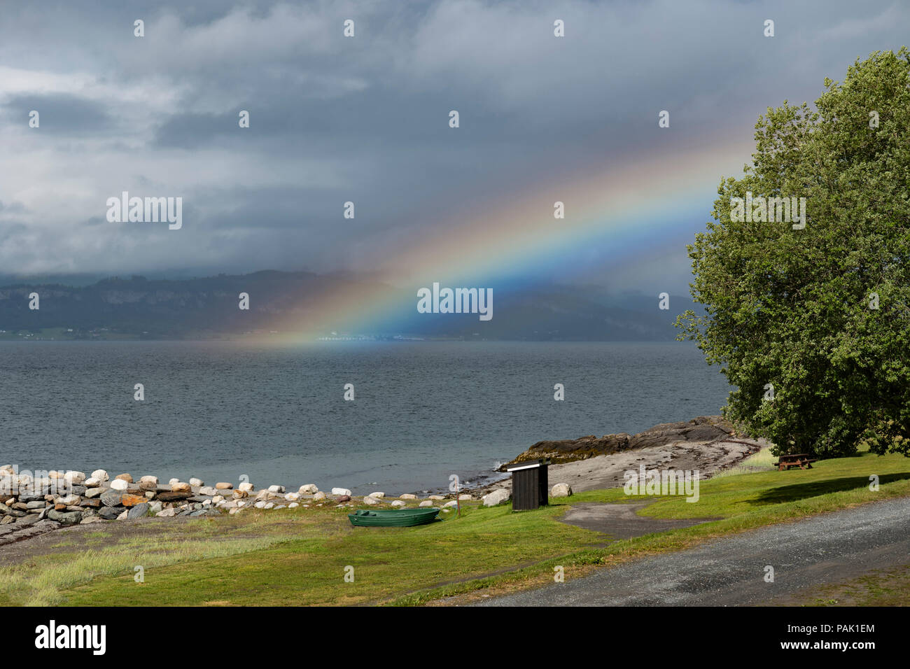 Rainbow over Tromdheimsfjorden, Norway Stock Photo