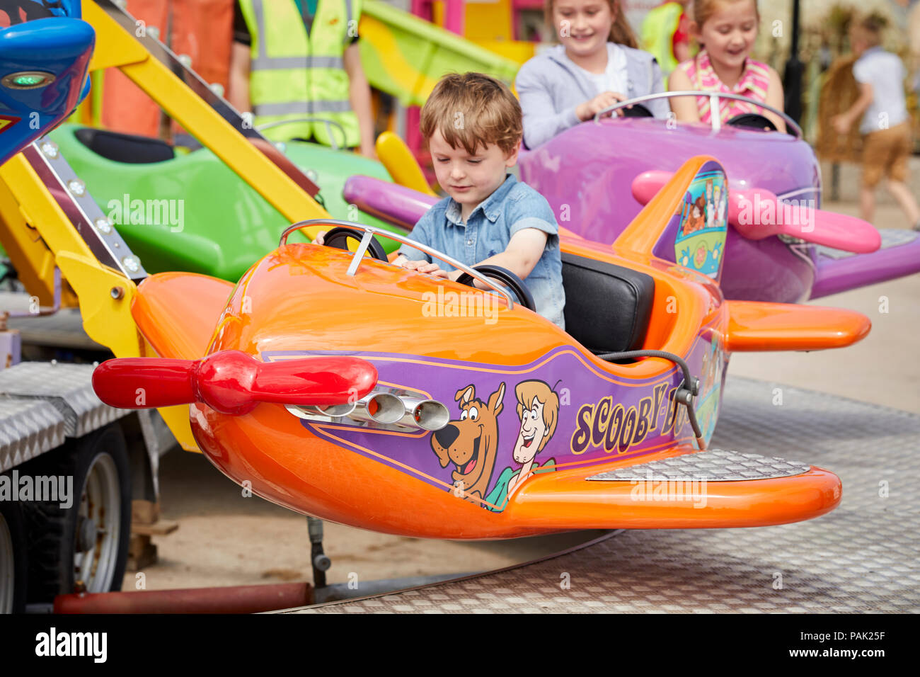 kids ride on aeroplane