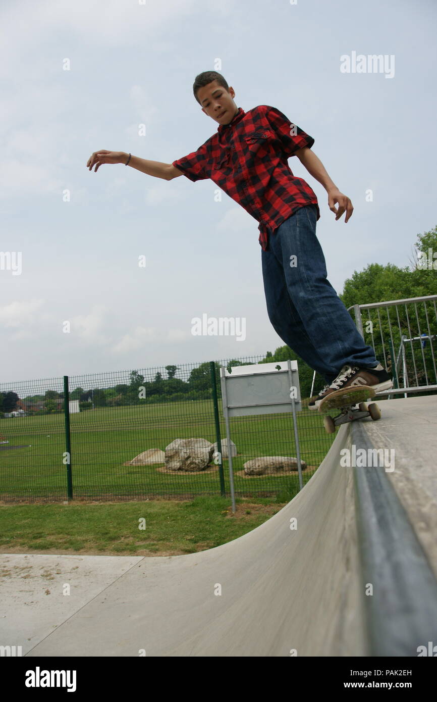 Skateboarding at a skate park Stock Photo