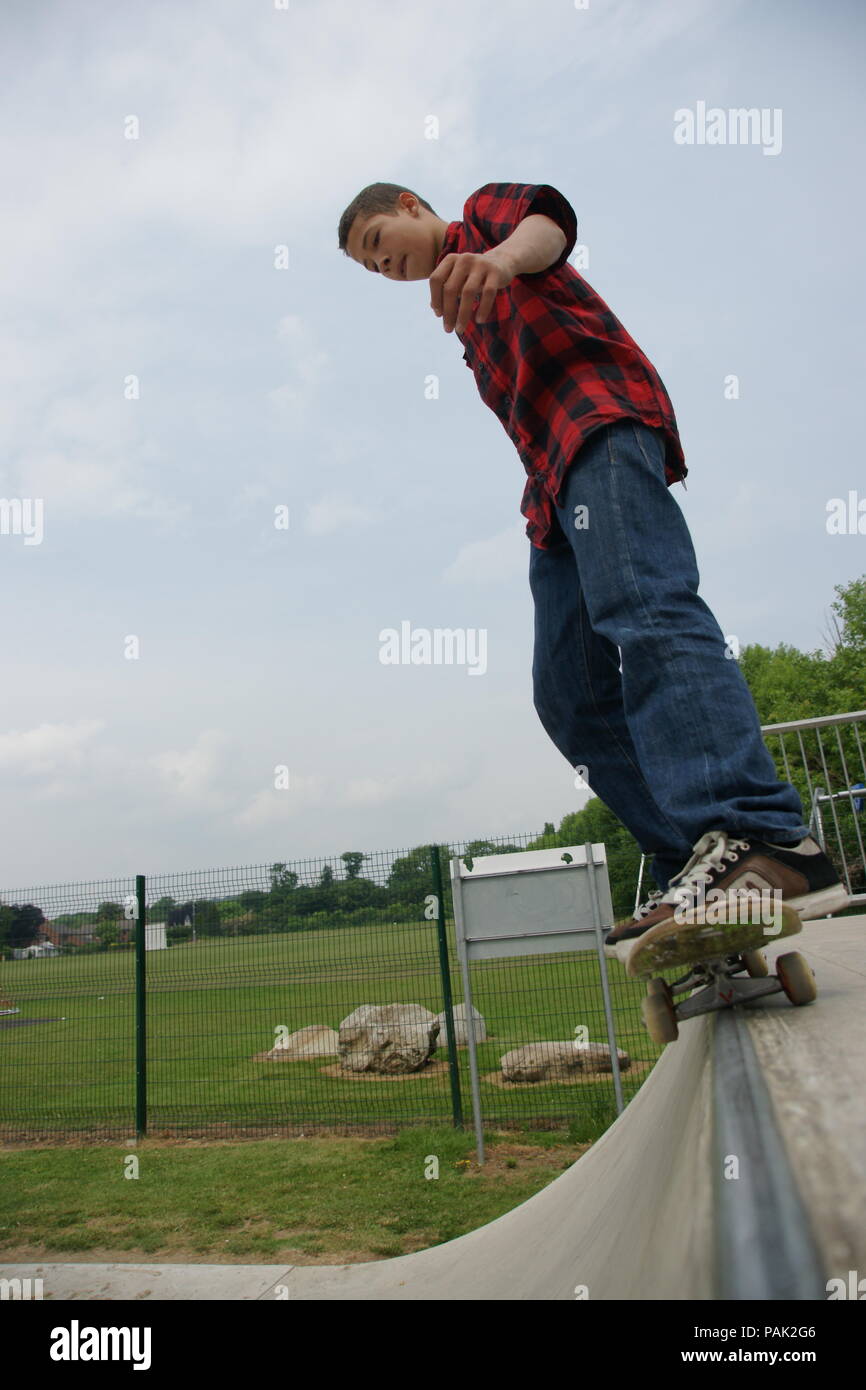 Skateboarding at a skate park Stock Photo