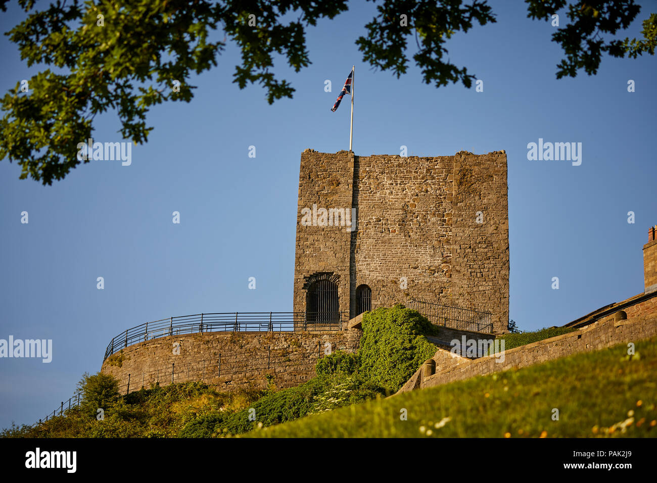 Clitheroe Borough of Ribble Valley Lancashire  The keep at Clitheroe Castle with union flag flying Grade I listed landmark on limestone crag Stock Photo