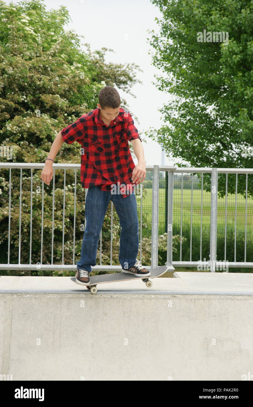 Skateboarding at a skate park Stock Photo