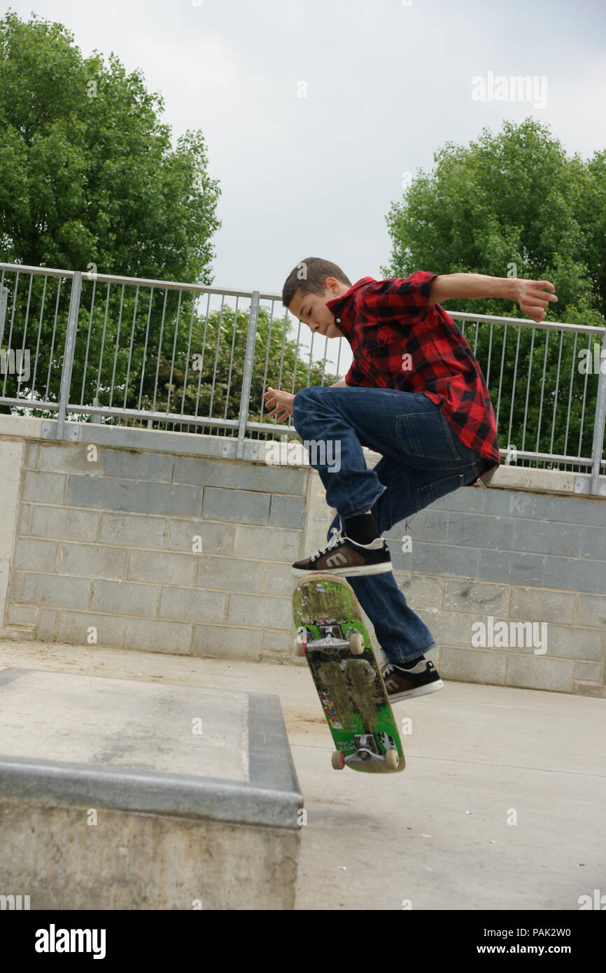 Skateboarding at a skate park Stock Photo