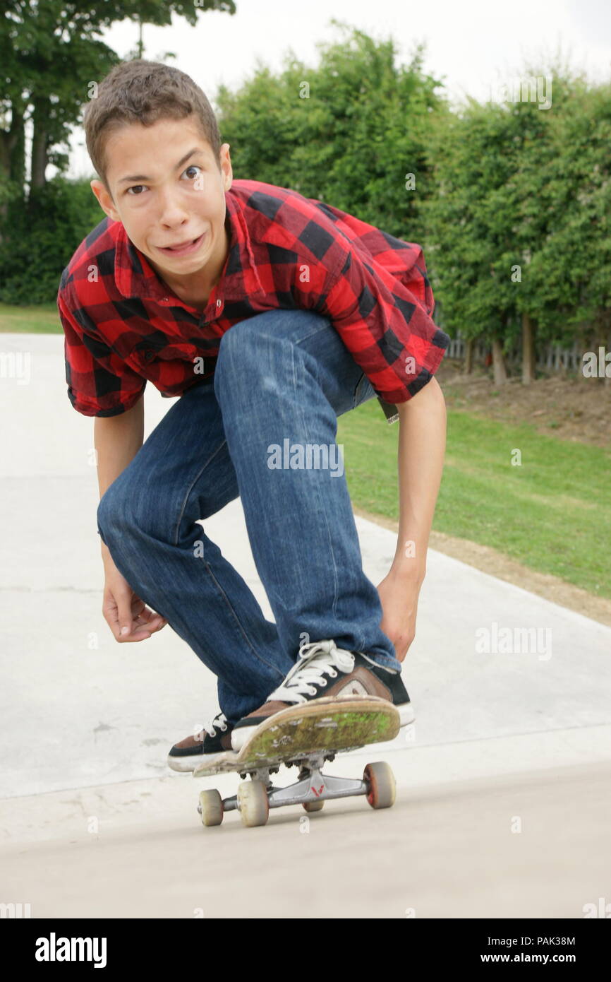 frightened skateboarder at skate park Stock Photo