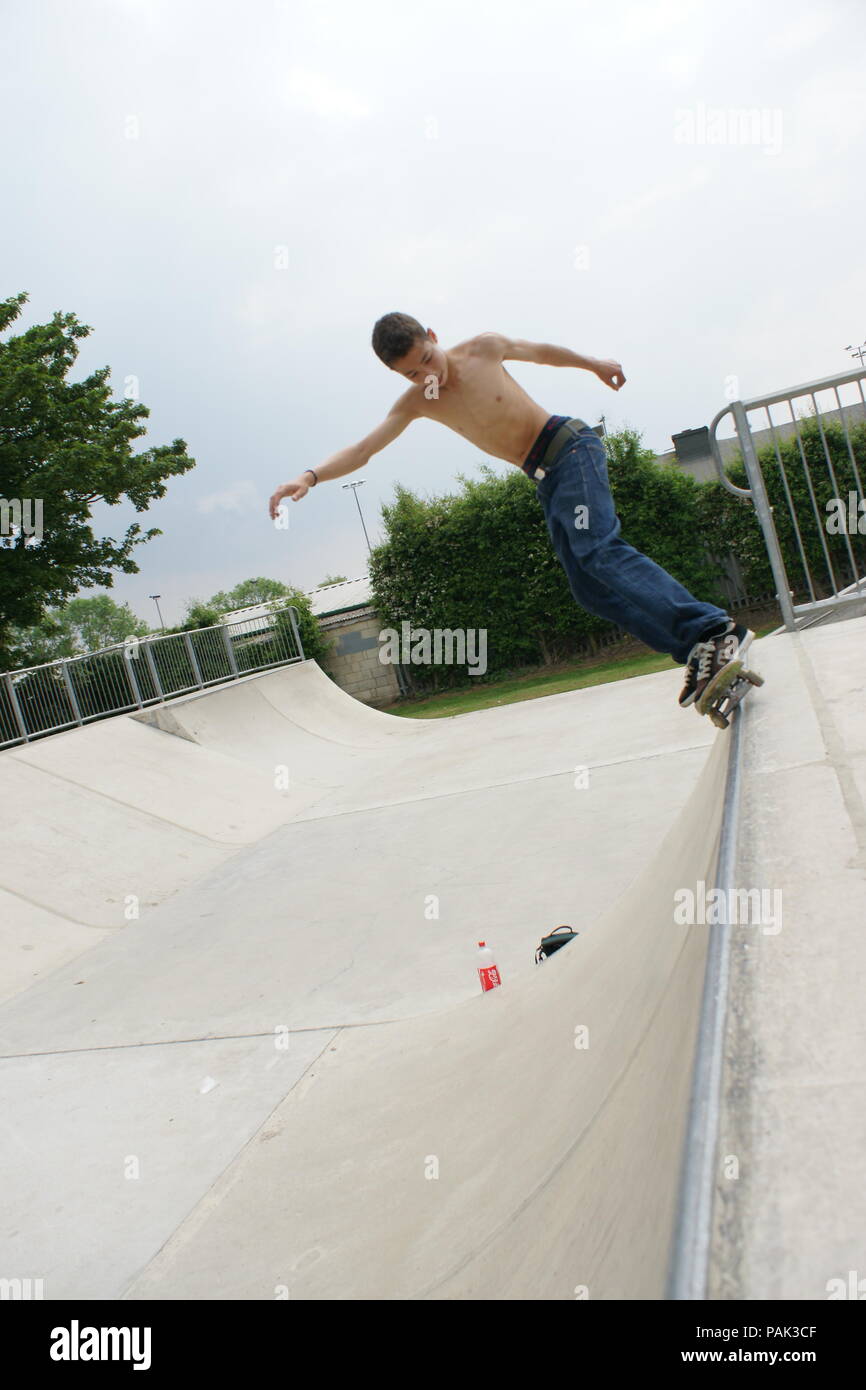 Skateboarding at a skate park Stock Photo