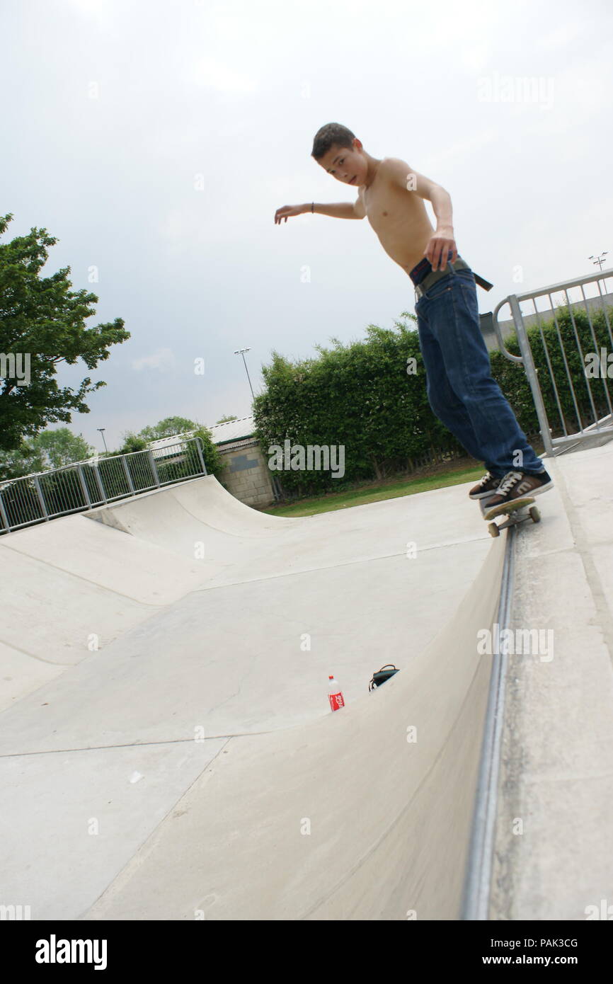 Skateboarding at a skate park Stock Photo