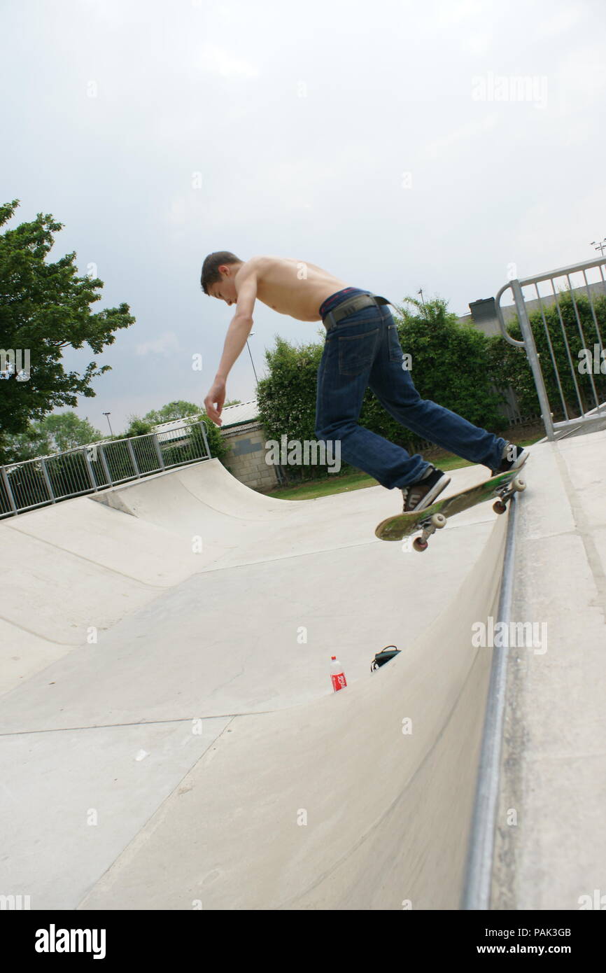 Skateboarding at a skate park Stock Photo