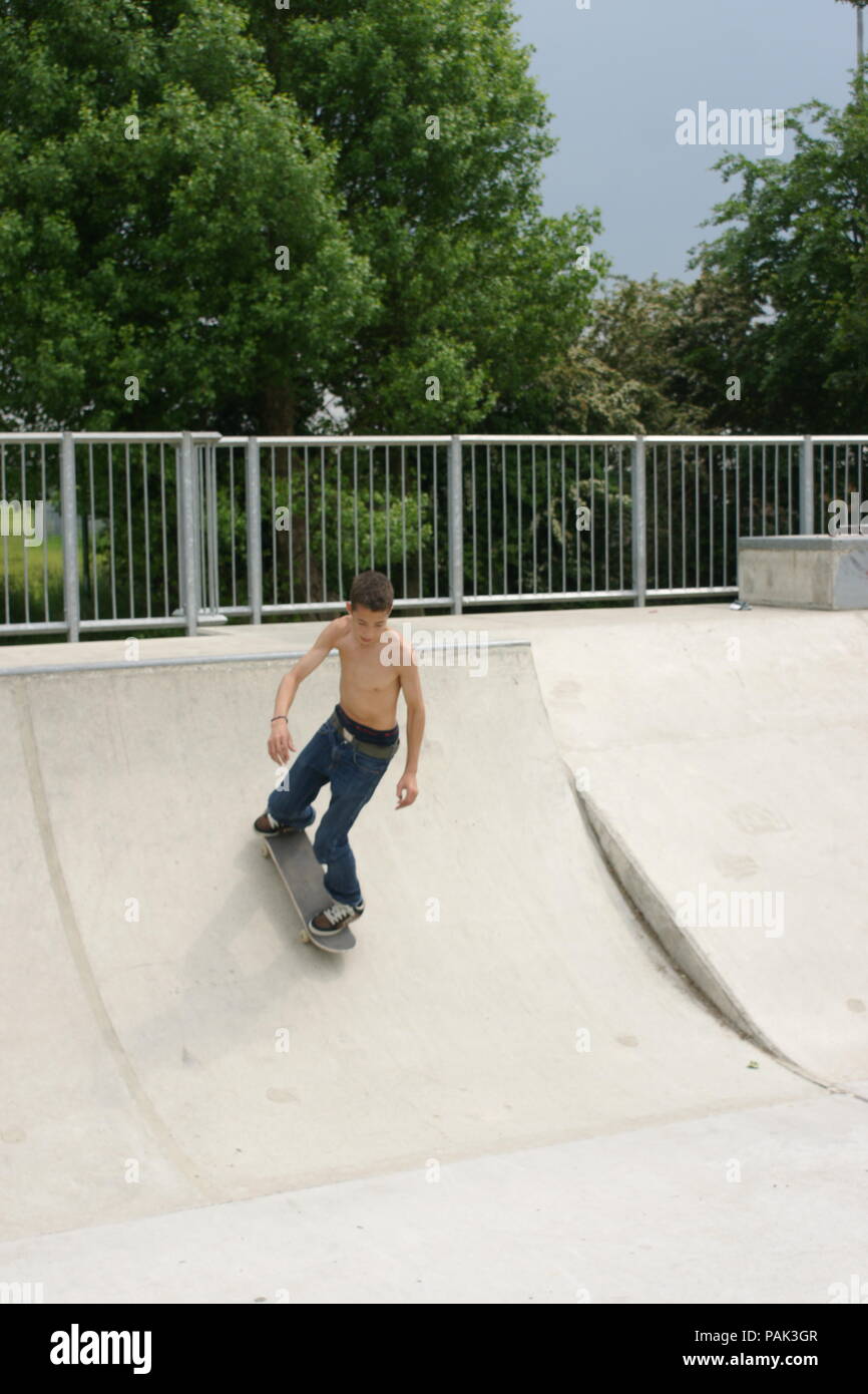 Skateboarding at a skate park Stock Photo