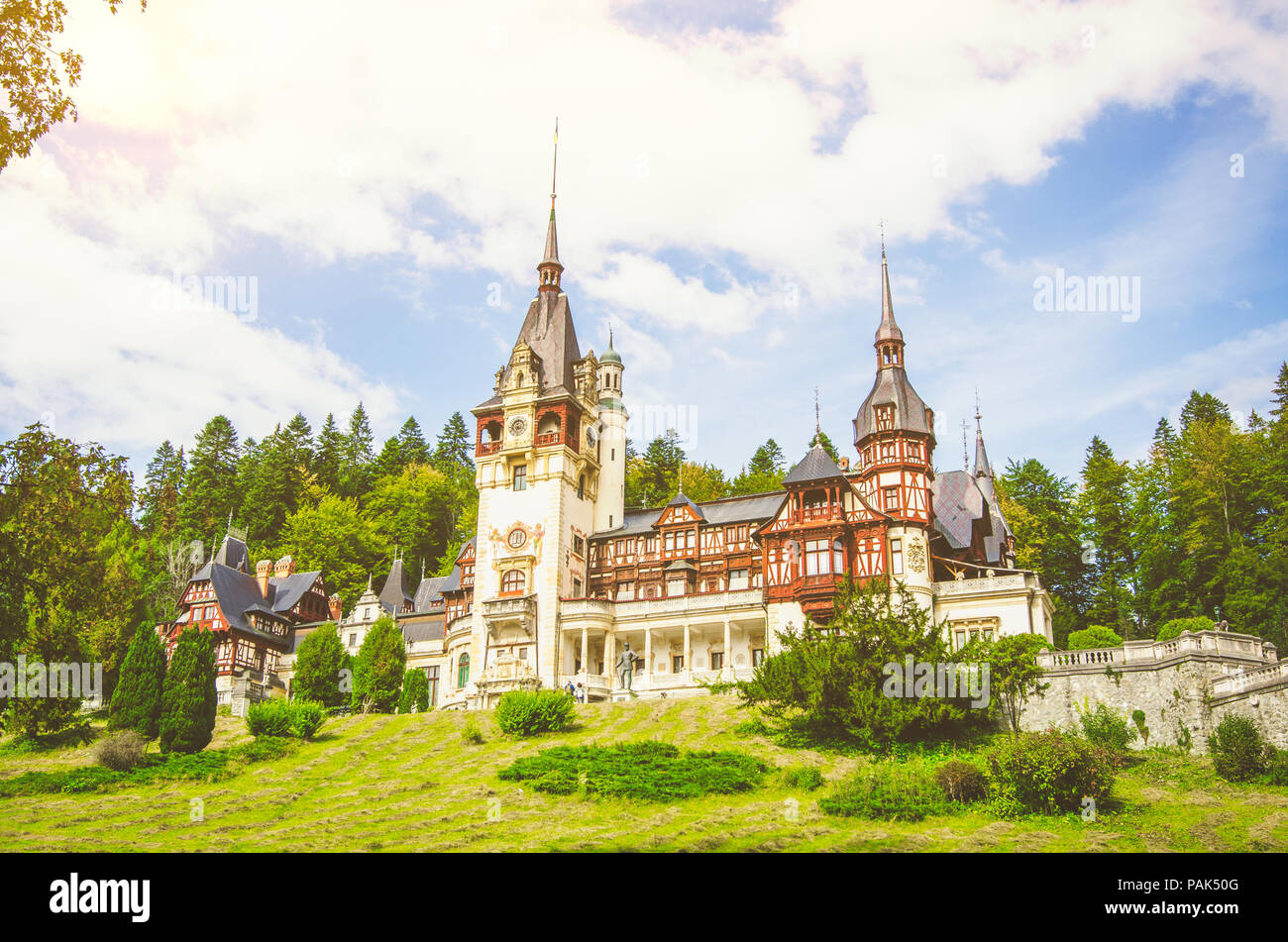 Peles Castle in Romania build by the Royal House during the 19th century in a beautiful eclectic and neo-renaissance architectural style with filters  Stock Photo