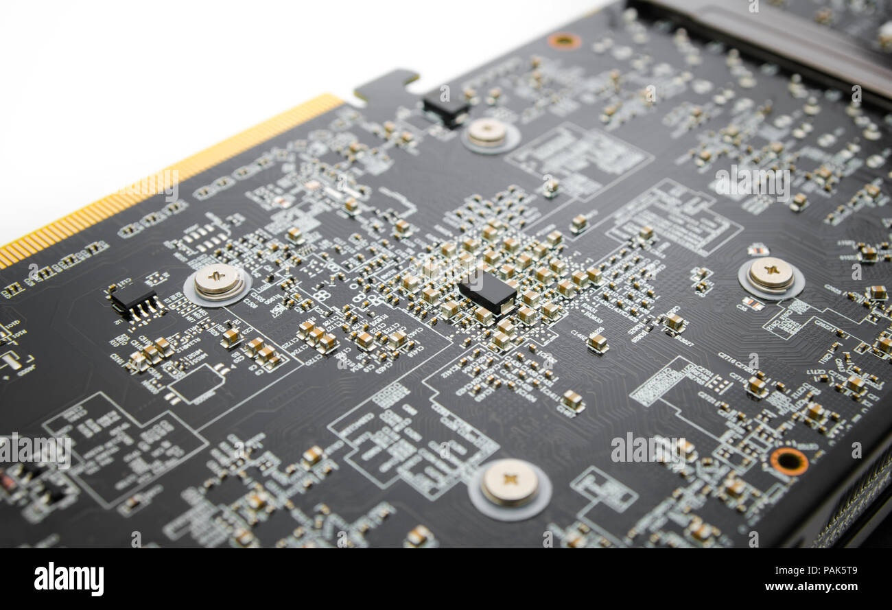 Close view of a chip on a circuit board with a socket and soft light on ...