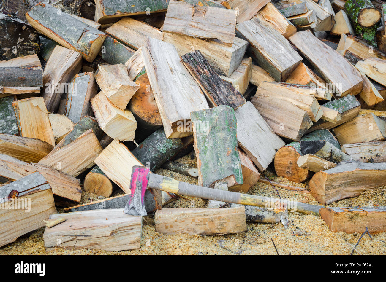 Chopped wood in a stack Stock Photo - Alamy