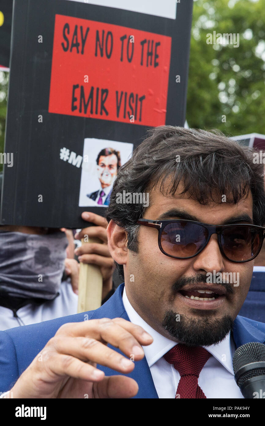 London, UK. 23rd July, 2018. Khalid Al-Hail, founder and president of the Qatar National Democratic Party (QNDP), speaks to the media in front of a protest by opponents of a visit to the UK by Qatar’s Emir Tamim Bin Hamad Al Thani in Parliament Square against Qatari support for extremist and terrorist groups. There was also a smaller counter-protest. Emir Tamim is expected to meet Prime Minister Theresa May during his visit. Credit: Mark Kerrison/Alamy Live News Stock Photo