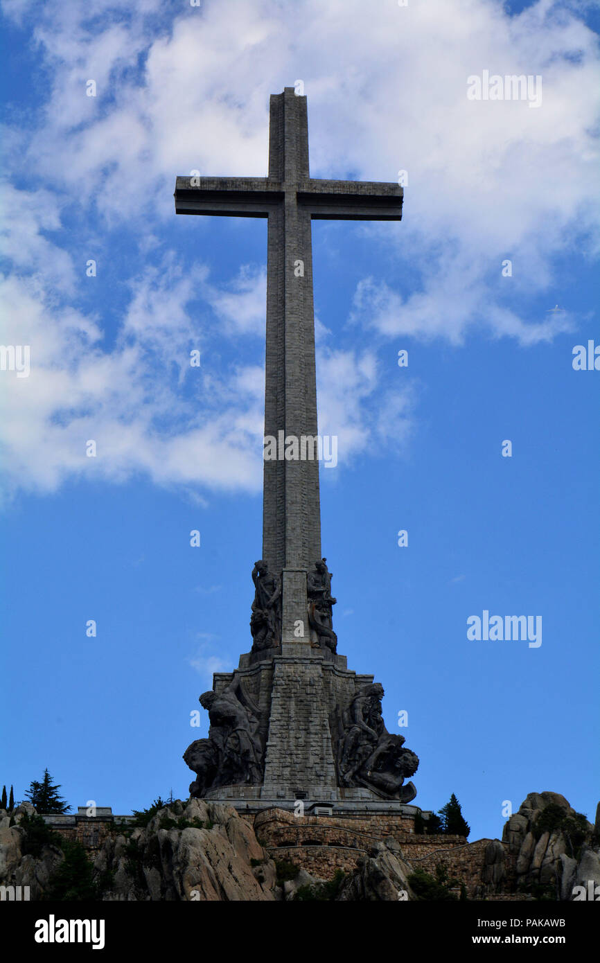 The 'Valley of the Fallen' is a Spanish monumental complex built between 1940 and 1958 in the village of El Escorial, in the Community of Madrid. The cross is 150 meters high. Francisco Franco (1892-1975) Head of the Spanish Government between 1938 and 1973 ordered the construction of this monument, where his remains rest with 33,872 combatants of the civil war, belonging to both sides. It is the largest common grave in Spain. It is the only place in the European Union where a dictator is kept cult and memory. Franco was allied with Adolf Hitler in World War II. The current government anno Stock Photo