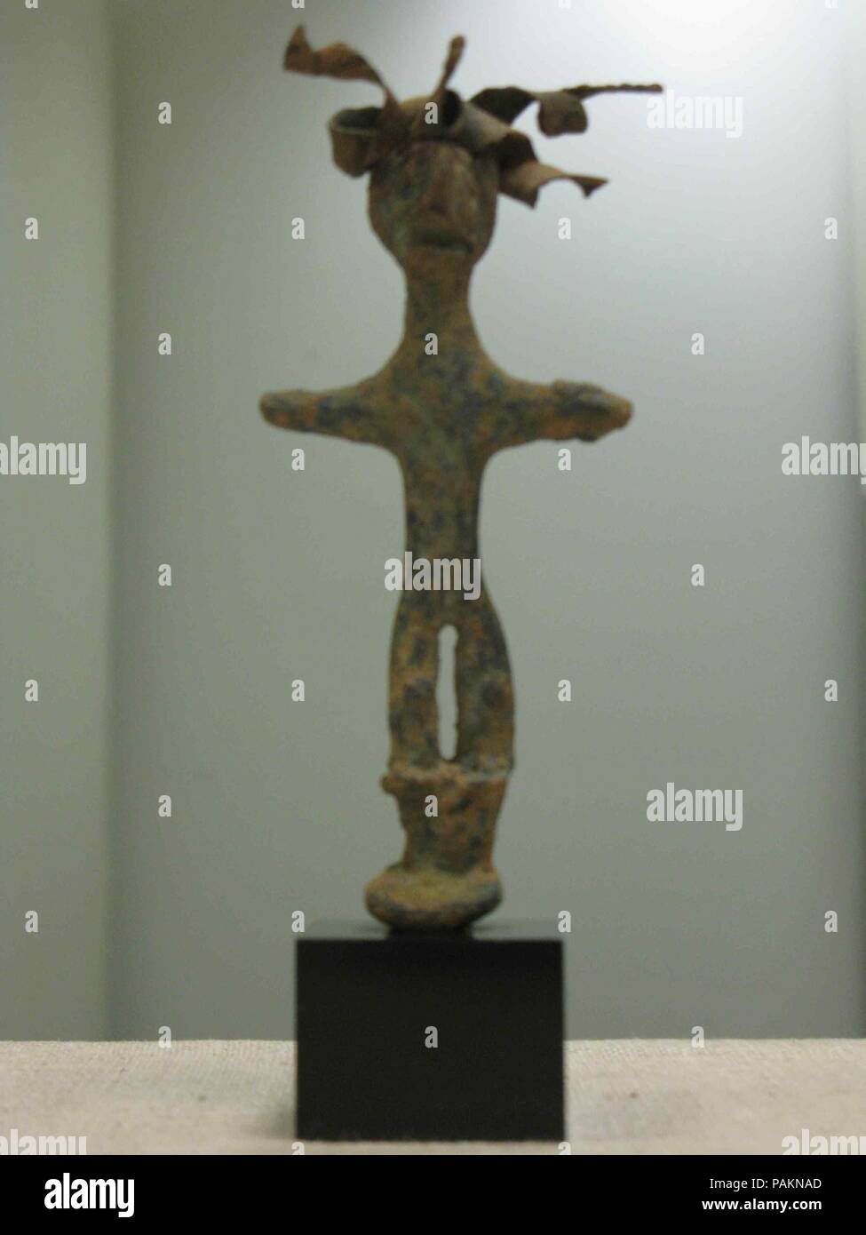 Standing figure. Dimensions: H. 4 1/16 × W. 1 3/4 × D. 7/8 in. (10.3 × 4.5 × 2.3 cm). Date: ca. early 2nd millennium B.C.. Museum: Metropolitan Museum of Art, New York, USA. Stock Photo