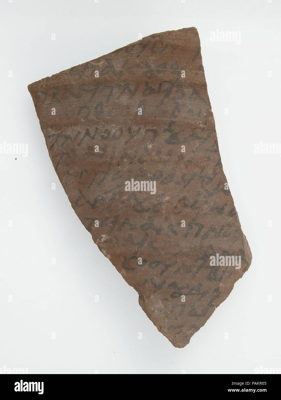 Ostrakon with a Letter. Culture: Coptic. Dimensions: 3 3/8 x 4 1/2 in. (8.5 x 11.5 cm). Date: 600. Museum: Metropolitan Museum of Art, New York, USA. Stock Photo