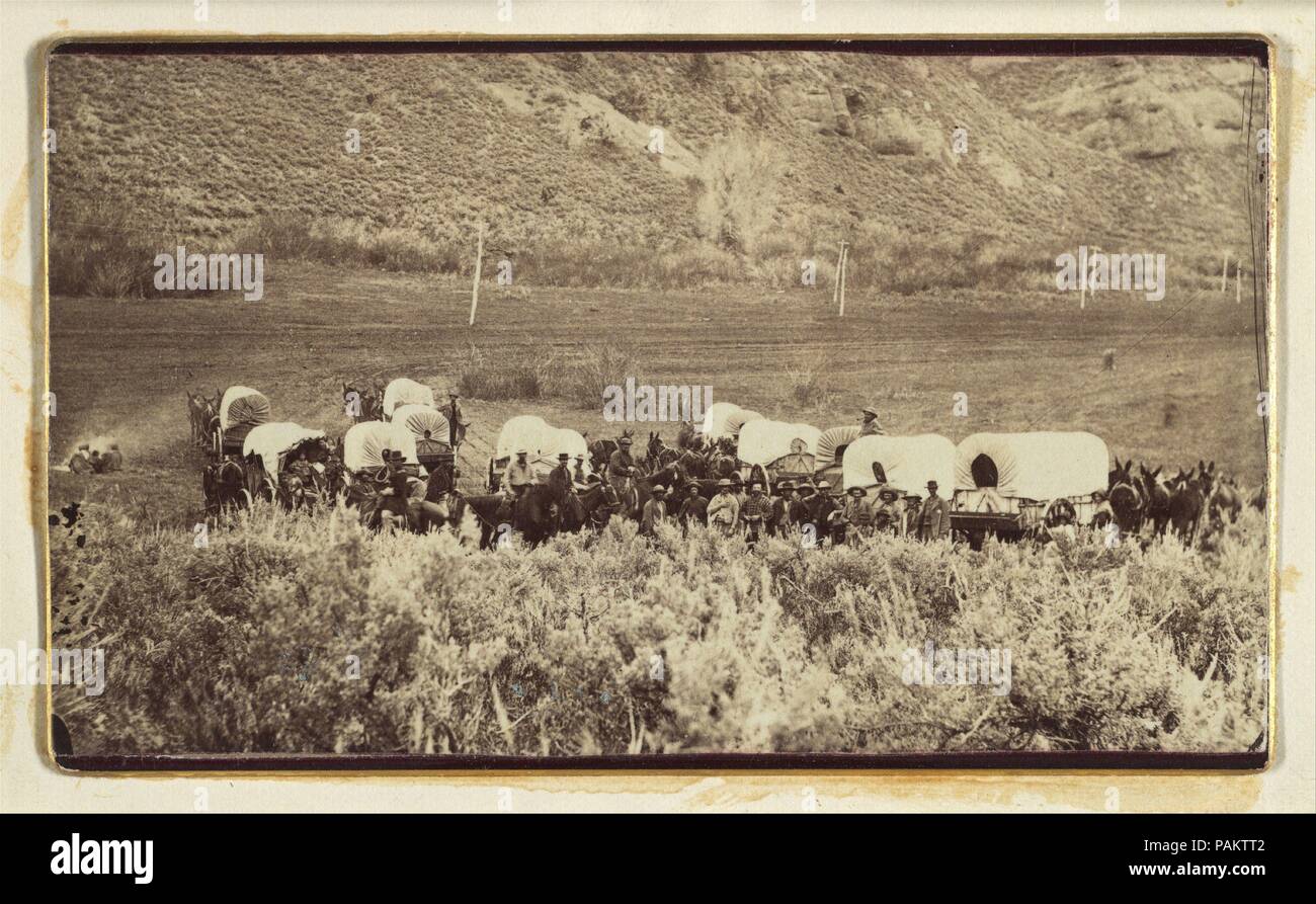 Mormon Emigrant Train, Echo Canyon. Artist: Charles William Carter (American, born Britain, 1832-1918). Dimensions: Image: 6.1 × 10.3 cm (2 3/8 × 4 1/16 in.). Date: ca. 1870.  Born in London, Charles Carter learned photography as a soldier in the British Army. In 1859 he moved to Salt Lake City in the Territory of Utah and soon joined the studio of his countryman and fellow Mormon Charles Roscoe Savage. Shortly thereafter he opened Carter's View Emporium, which catered to the rapidly growing Mormon community in Brigham Young's theocratic State of Deseret. From 1850 to 1870 the population of Sa Stock Photo