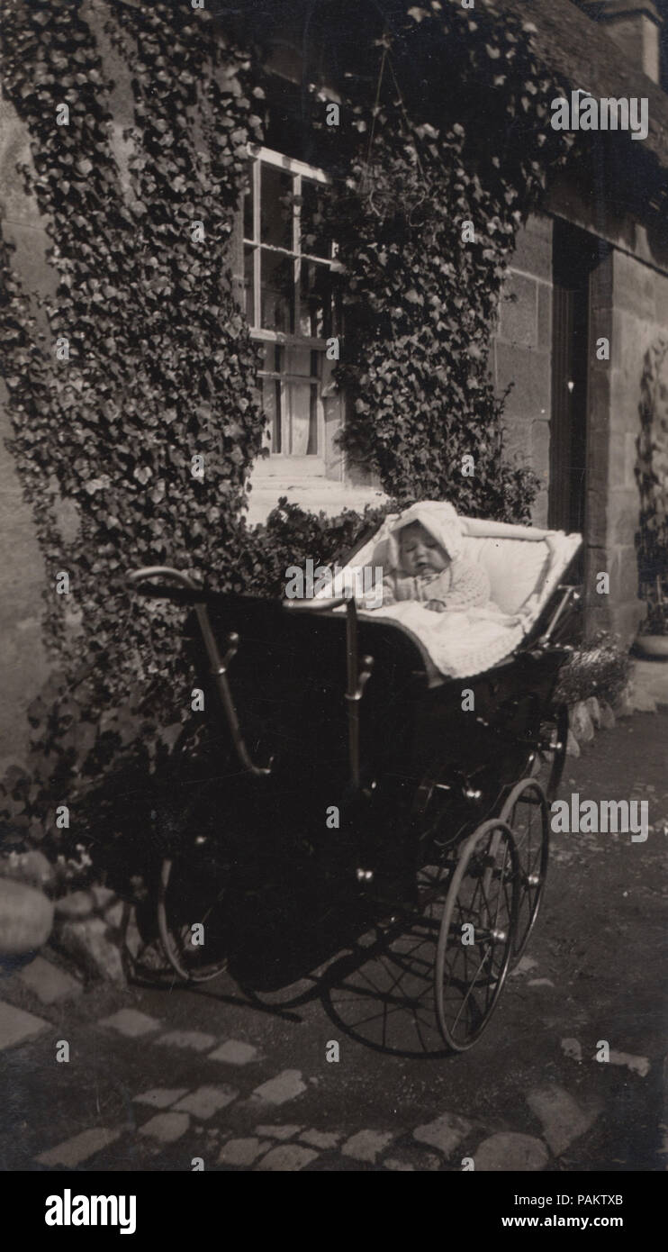 Vintage Photograph of a Baby in a Pram Stock Photo