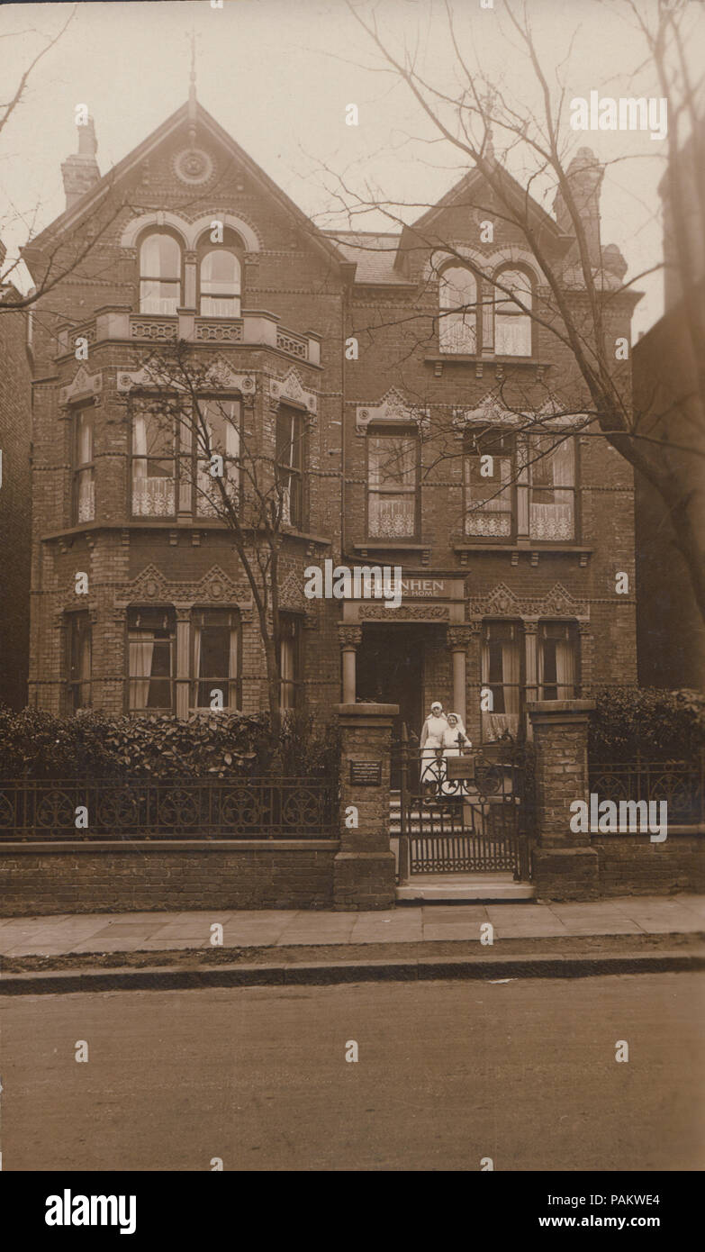 Vintage Photograph of The Glenhen Nursing Home. Two Nurses Stood at The Front Door Stock Photo