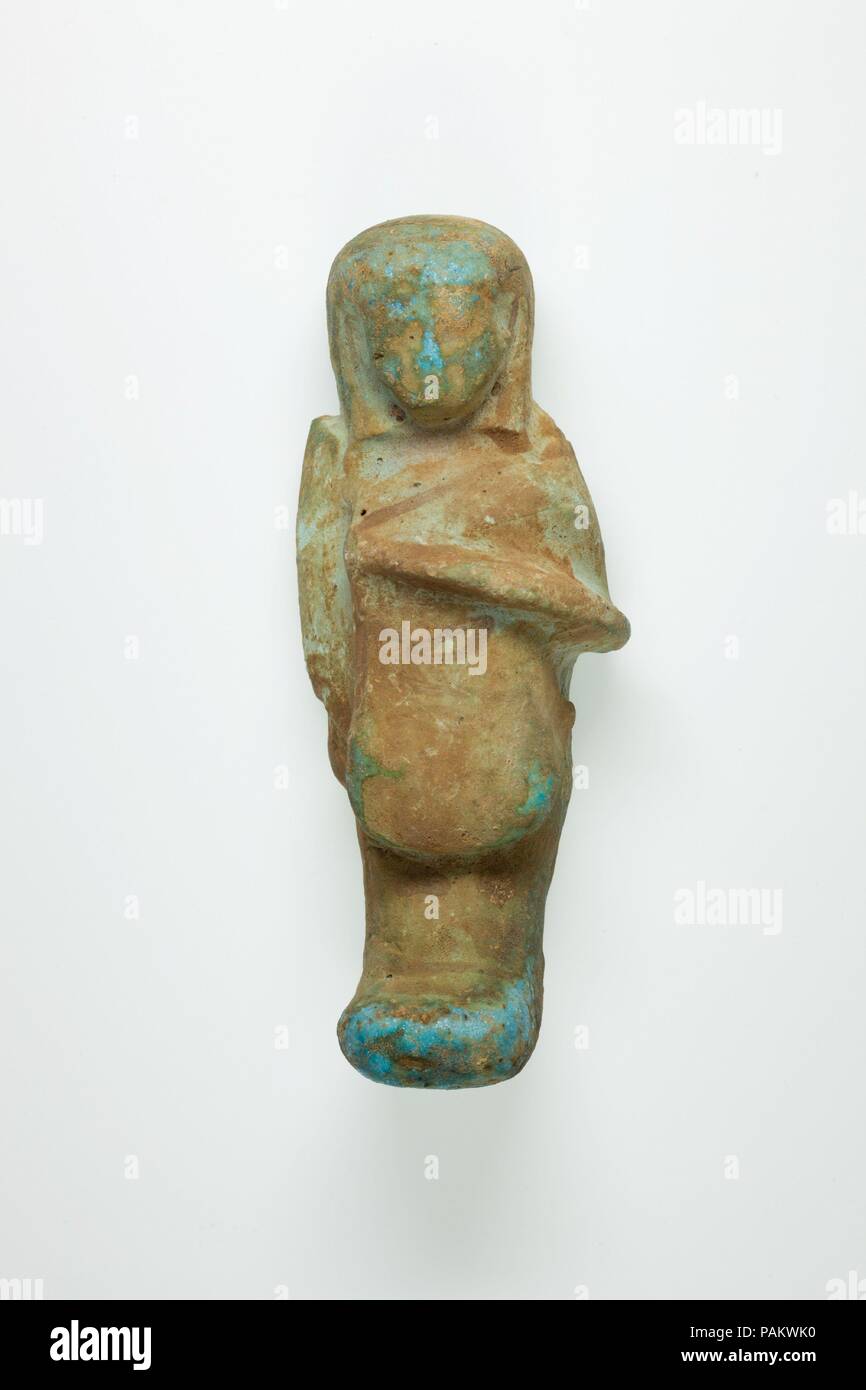 Overseer Shabti of Henettawy (C), Daughter of Isetemkheb. Dimensions: h. 11.7 × w. 4.8 × d. 3.4 cm (4 5/8 × 1 7/8 × 1 5/16 in.). Dynasty: Dynasty 21. Date: ca. 990-970 B.C.. Museum: Metropolitan Museum of Art, New York, USA. Stock Photo