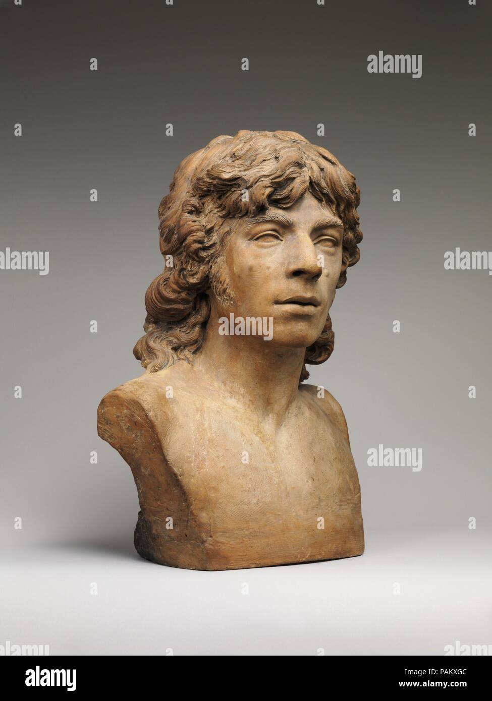 Bust of a man. Artist: Joseph Chinard (French, Lyon 1756-1813 Lyon). Culture: French, Lyon. Dimensions: Overall (confirmed): 17 1/4 × 11 1/2 × 9 1/2 in. (43.8 × 29.2 × 24.1 cm). Date: ca. 1790-95.  This bust, initially acquired as a portrait of the radical pamphleteer, Jacques-René Hébert, nicknamed Père Duchesne, is now believed to depict an unidentified young revolutionary. The informality of the tousled hair contrasts with the classically inspired herm cut of the bust. Museum: Metropolitan Museum of Art, New York, USA. Stock Photo