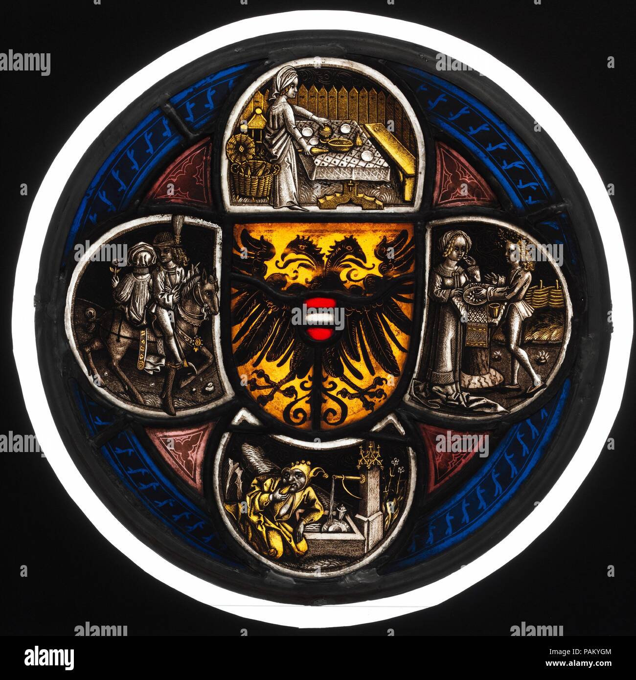 Quatrefoil Roundel with Arms and Secular Scenes. Culture: German. Dimensions: Diam: 12 1/4 in. (31.1 cm). Date: 1490-1500.  In the center of this panel are the imperial arms of Austria. The scenes in the quatrefoil represent a variety of secular vignettes. These scenes may signify a tournament masquerade of the type held in Nuremberg before Lent, which would explain the presence of fools, feasts, and lovers. Such imagery was understood as social satire in late medieval art. The number of similar quatrefoil panels that have survived suggests considerable popularity. The origin of the designs is Stock Photo