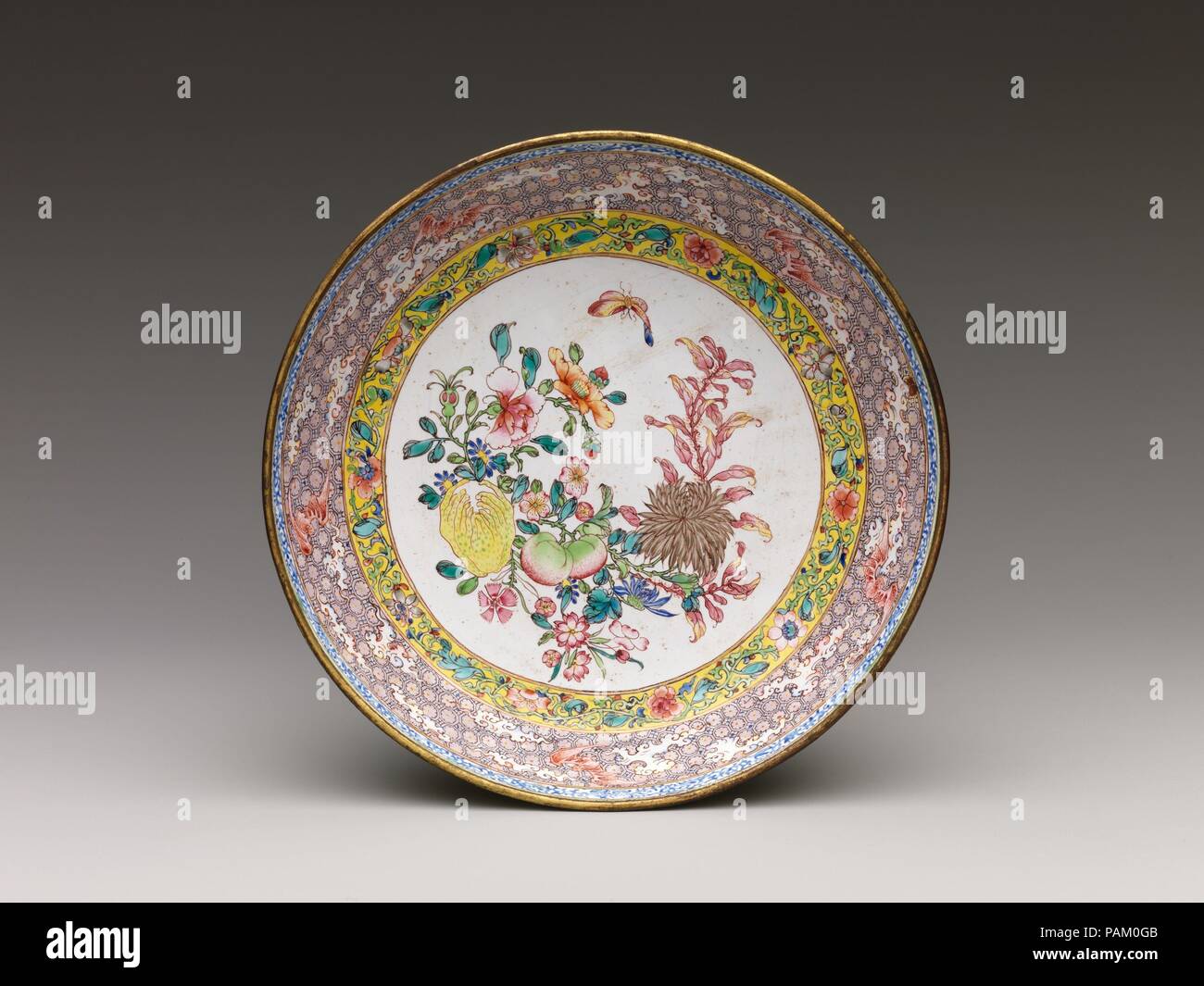 Dish with Flowers and Butterfly. Culture: China. Dimensions: Diam. 6 3/8 in. (16.2 cm). Date: 18th century. Museum: Metropolitan Museum of Art, New York, USA. Stock Photo