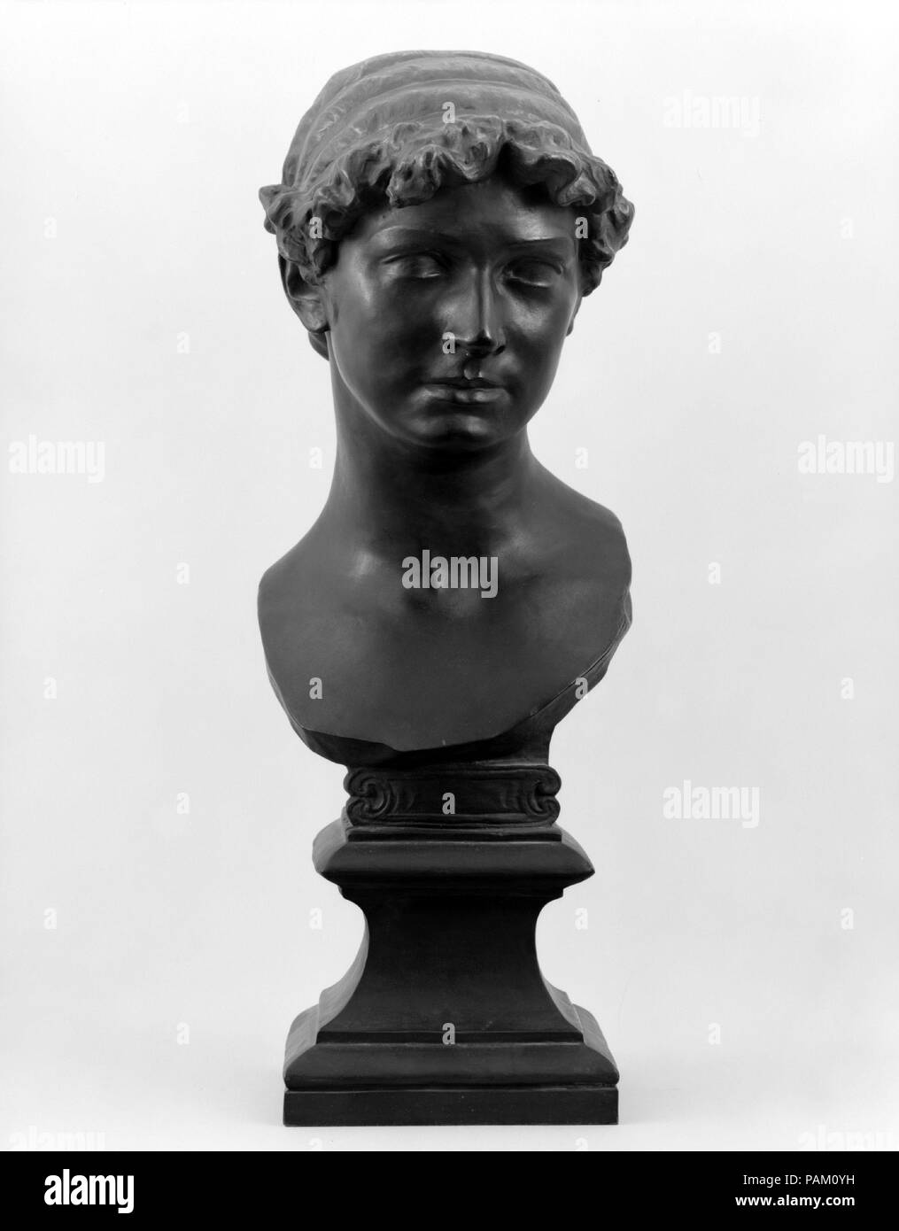 Maud Morgan. Artist: Olin Levi Warner (American, West Suffield, Connecticut 1844-1896 New York). Dimensions: 22 3/4 x 7 1/4 x 10 in. (57.8 x 18.4 x 25.4 cm). Date: 1880, cast 1897-98.  Warner may have been inspired to model a portrait of harpist Maud Morgan (1860-1941) after seeing her perform in New York. There is no evidence of a commission, so presumably the sculptor undertook the subject on his own initiative. His treatment of the bust integrated antique forms with the naturalistic features of Morgan's face. Morgan's filleted hair, blank eyes, and fragmented shoulder termination align the  Stock Photo