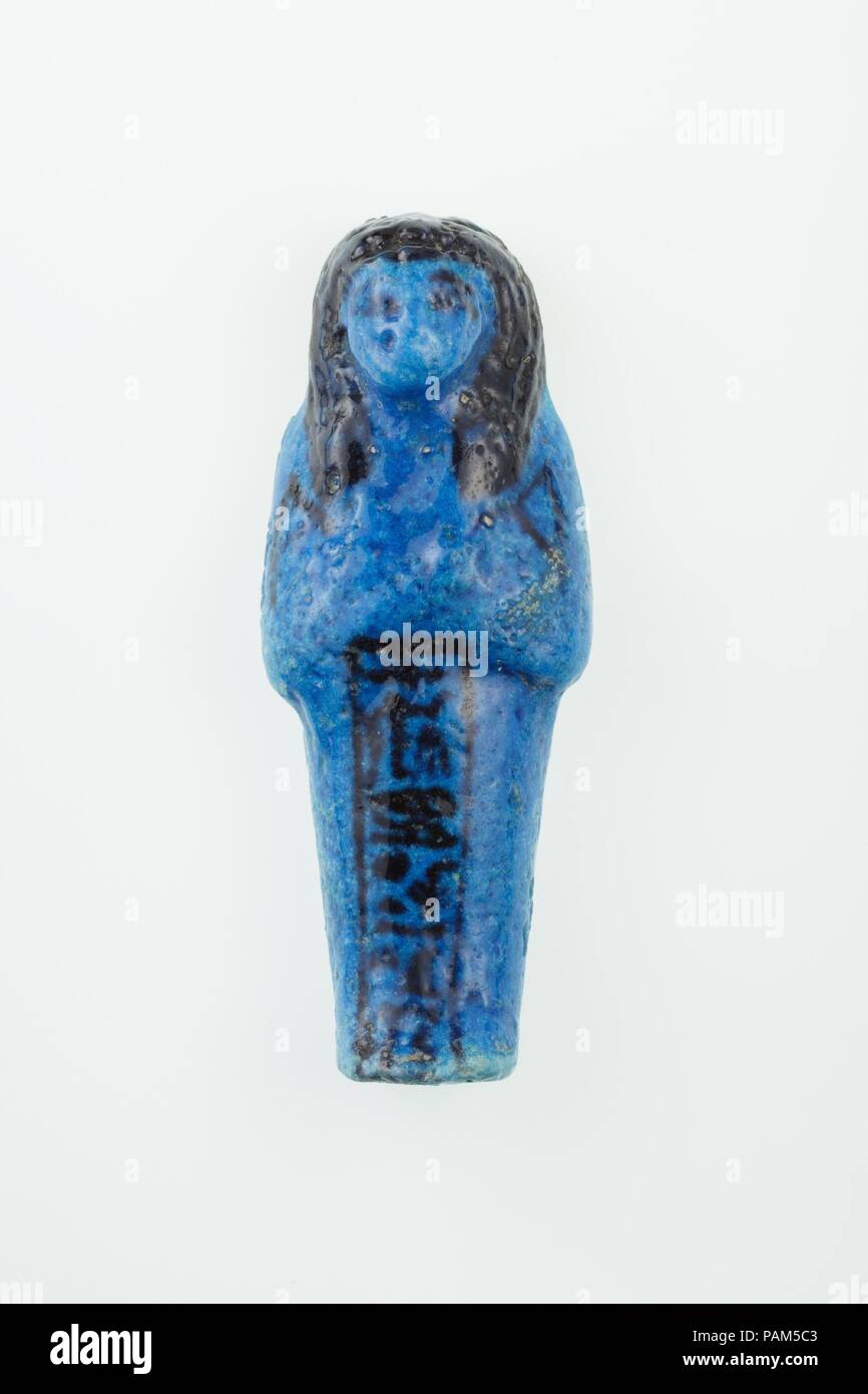 Worker Shabti of Nany. Dimensions: H. 8.7 × W. 3.2 × D. 2.1 cm (3 7/16 × 1 1/4 × 13/16 in.). Dynasty: Dynasty 21. Reign: reign of Psusennes I. Date: ca. 1050 B.C..  See 30.3.30.1a, b. Museum: Metropolitan Museum of Art, New York, USA. Stock Photo