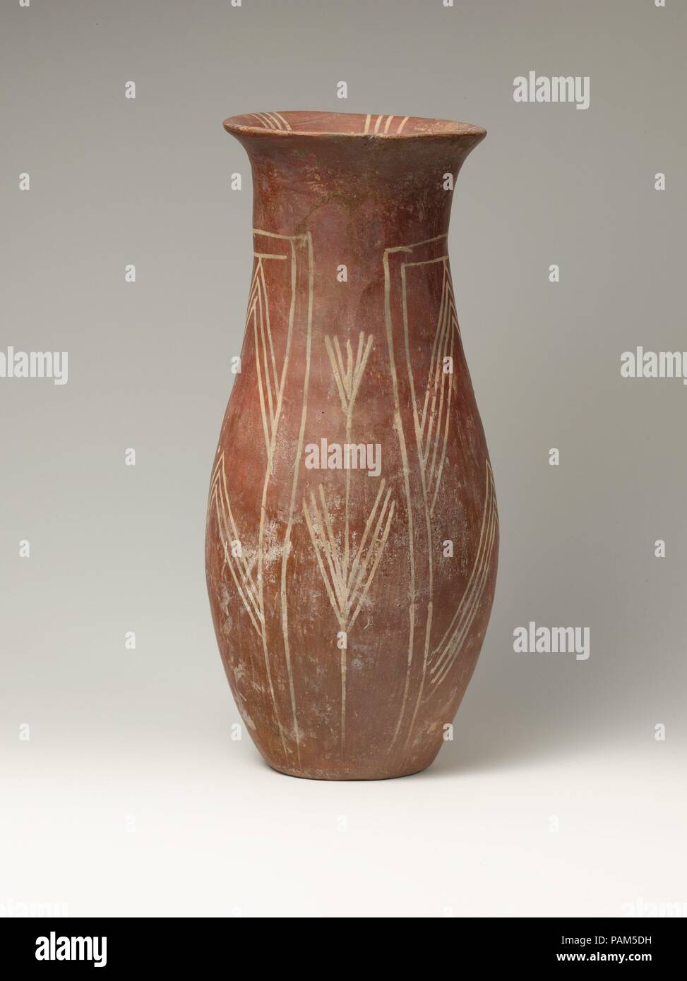 White cross-lined ware vase with plant designs. Dimensions: H: 28 cm (11 in.); diam: 11.1 cm (4 3/4 in.). Date: ca. 3900-3700 B.C.. Museum: Metropolitan Museum of Art, New York, USA. Stock Photo