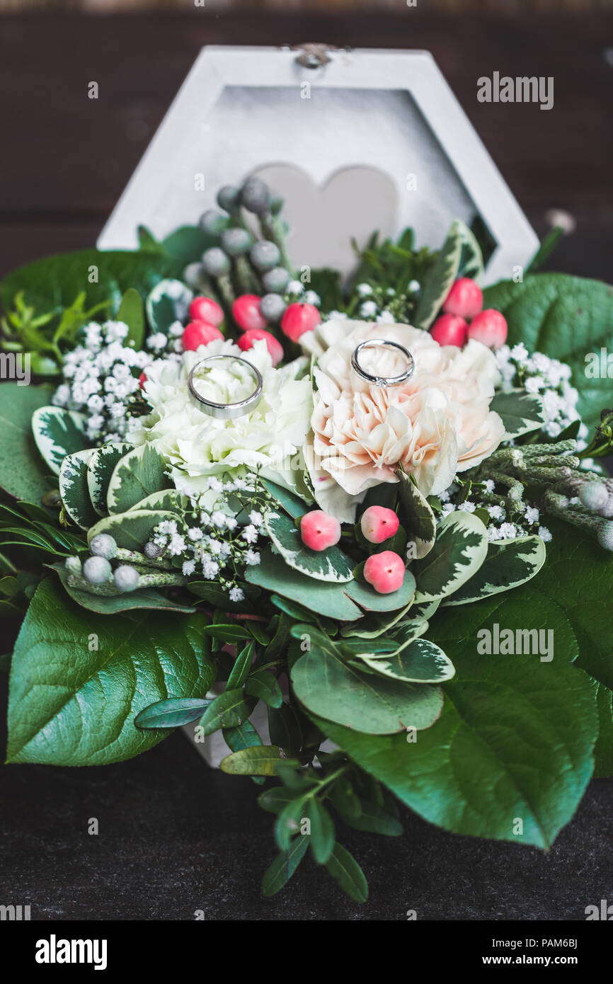 Two White Gold Wedding Rings In Casket Close Up With Fresh Flowers For Wedding Ceremony Stock Photo Alamy