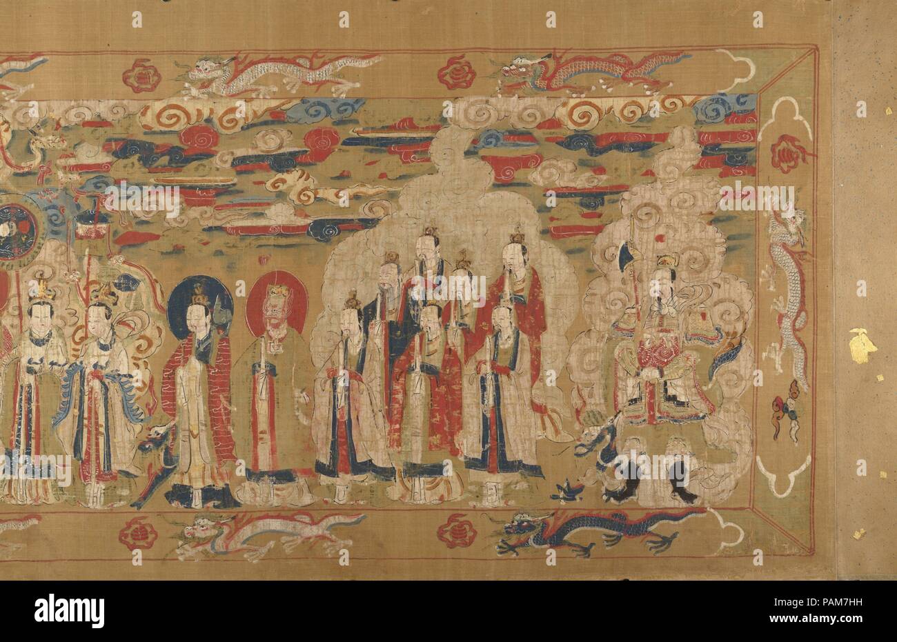 Investiture of a Daoist Deity. Artist: Unidentified Artist. Culture: China. Dimensions: Image: 19 in. × 30 ft. 3/4 in. (48.3 × 916.3 cm)  Overall with mounting: 19 in. × 34 ft. 1 in. (48.3 × 1038.9 cm). Date: inscription dated 1641.  This painting, an unsigned work of a provincial atelier, is a rare example of popular religious art. Modeled on imperial commendation scrolls, with their ornamental borders of dragons chasing flaming pearls, the scroll illustrates the investiture of a local god into the Daoist pantheon. The first half of the scroll depicts the court of the Jade Emperor, supreme de Stock Photo